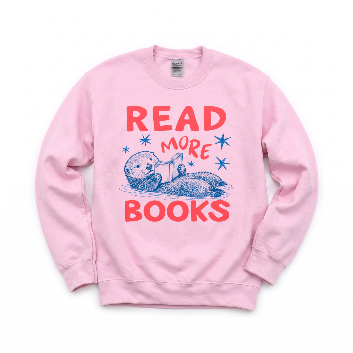 Otter Reading Book graphic on Gildan 18000 in Light Pink