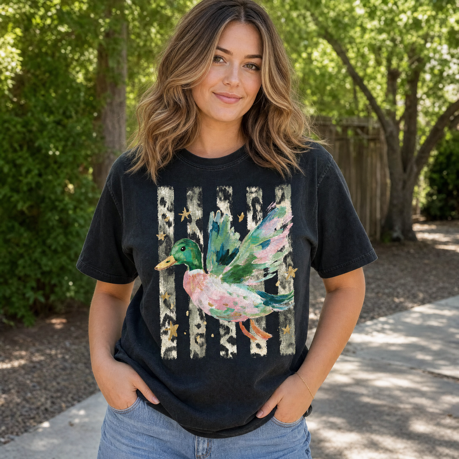Model wearing the Painted Duck comfort colors tee in Black