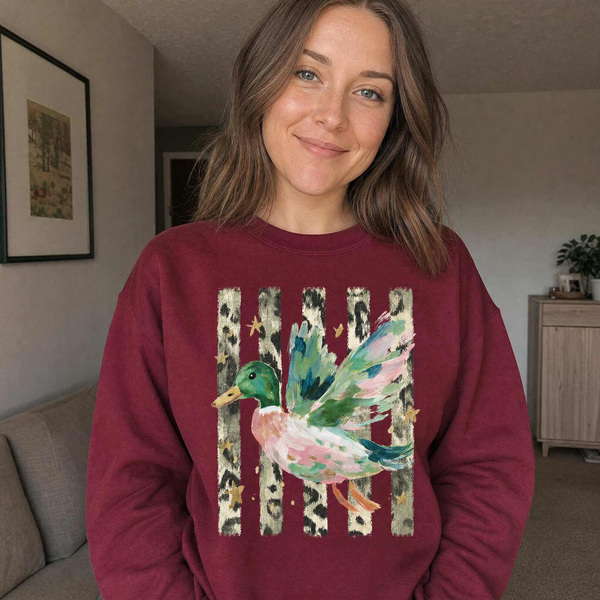 Model wearing the Painted Duck sweatshirt in Maroon