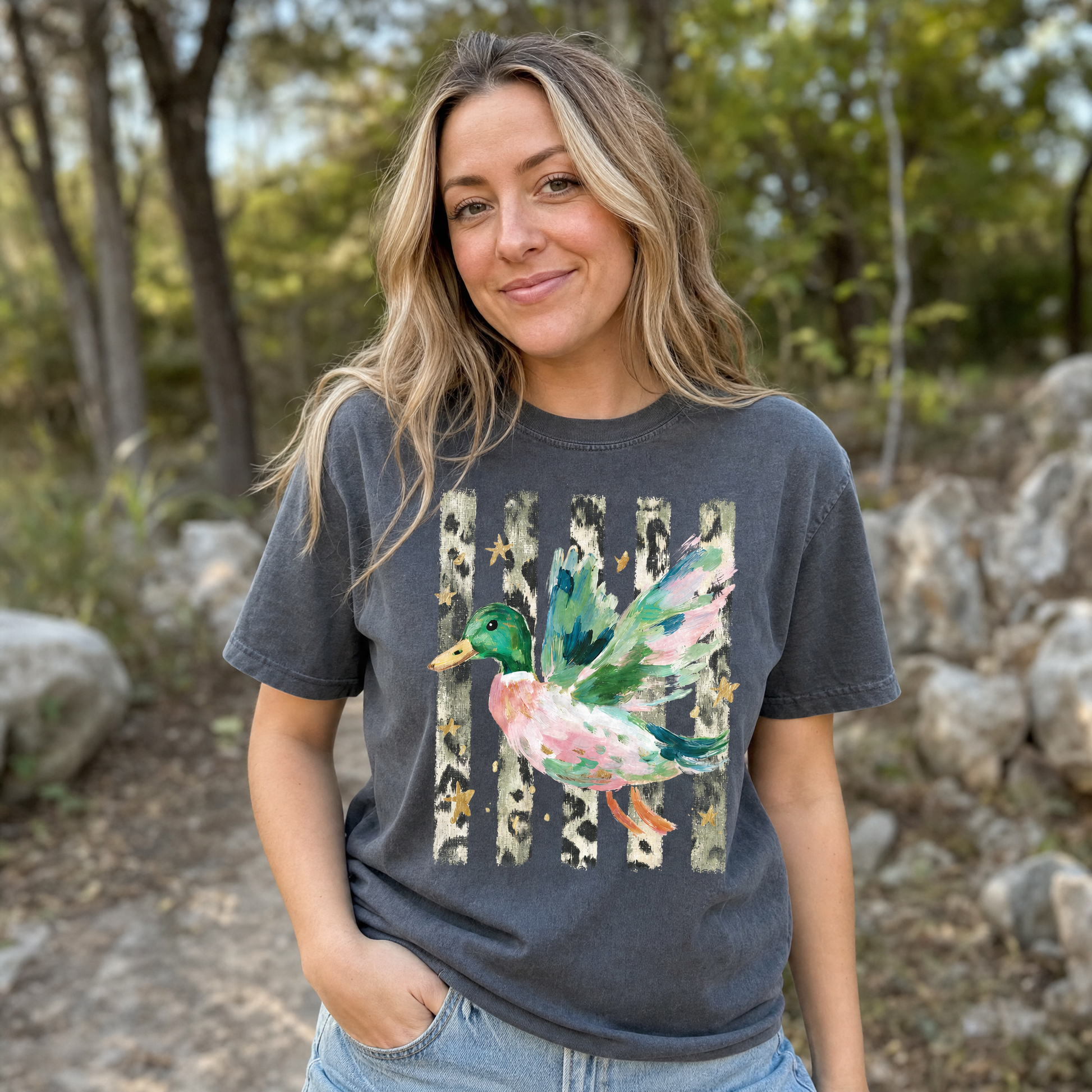 Model wearing the Painted Duck comfort colors tee in Pepper