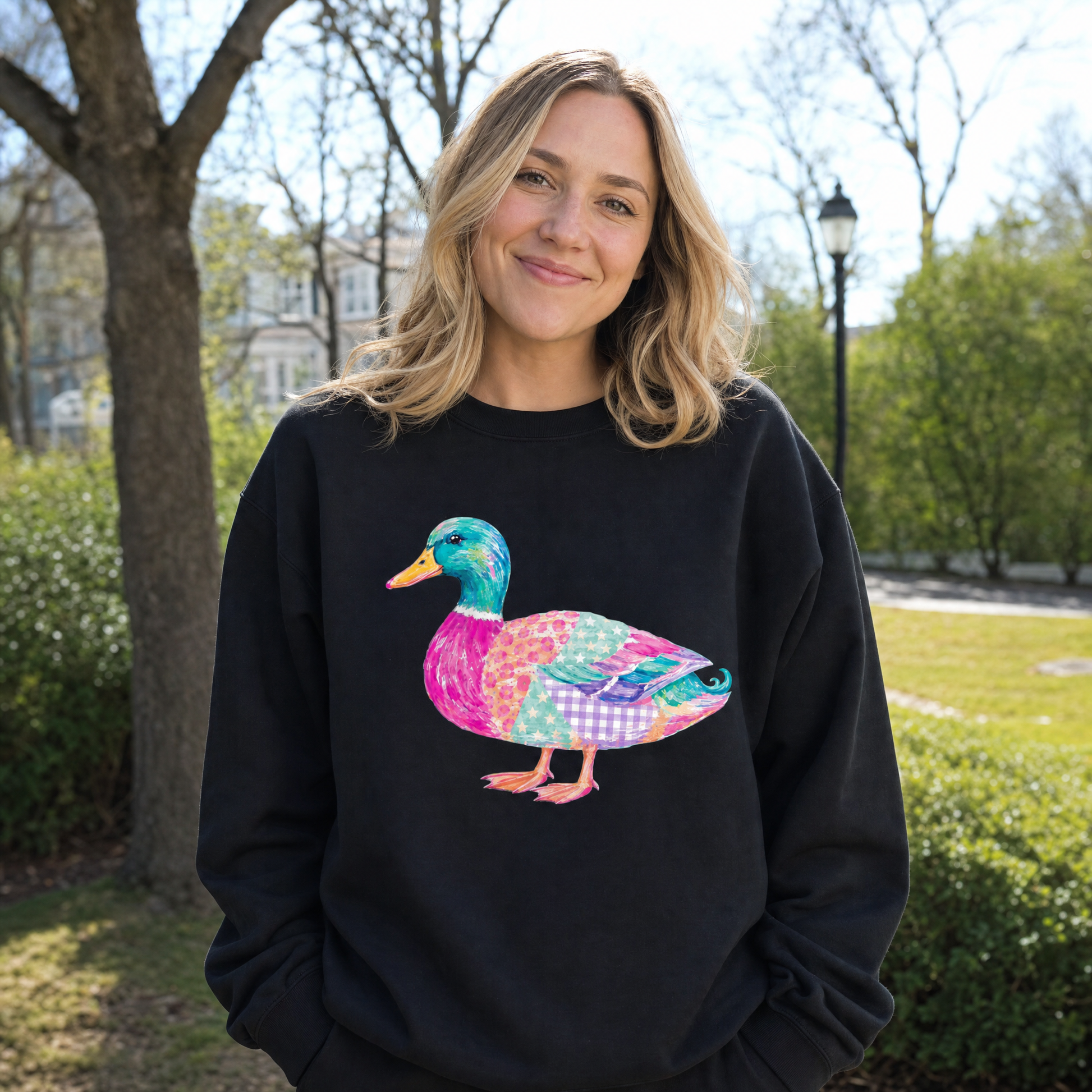 Model wearing the Patchwork Duck sweatshirt in Black