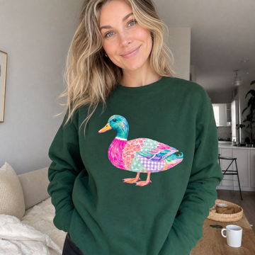 Model wearing the Patchwork Duck sweatshirt in Forest Green