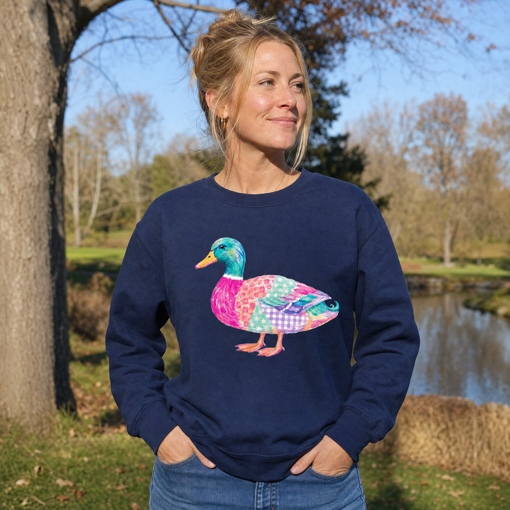 Model wearing the Patchwork Duck sweatshirt in Navy