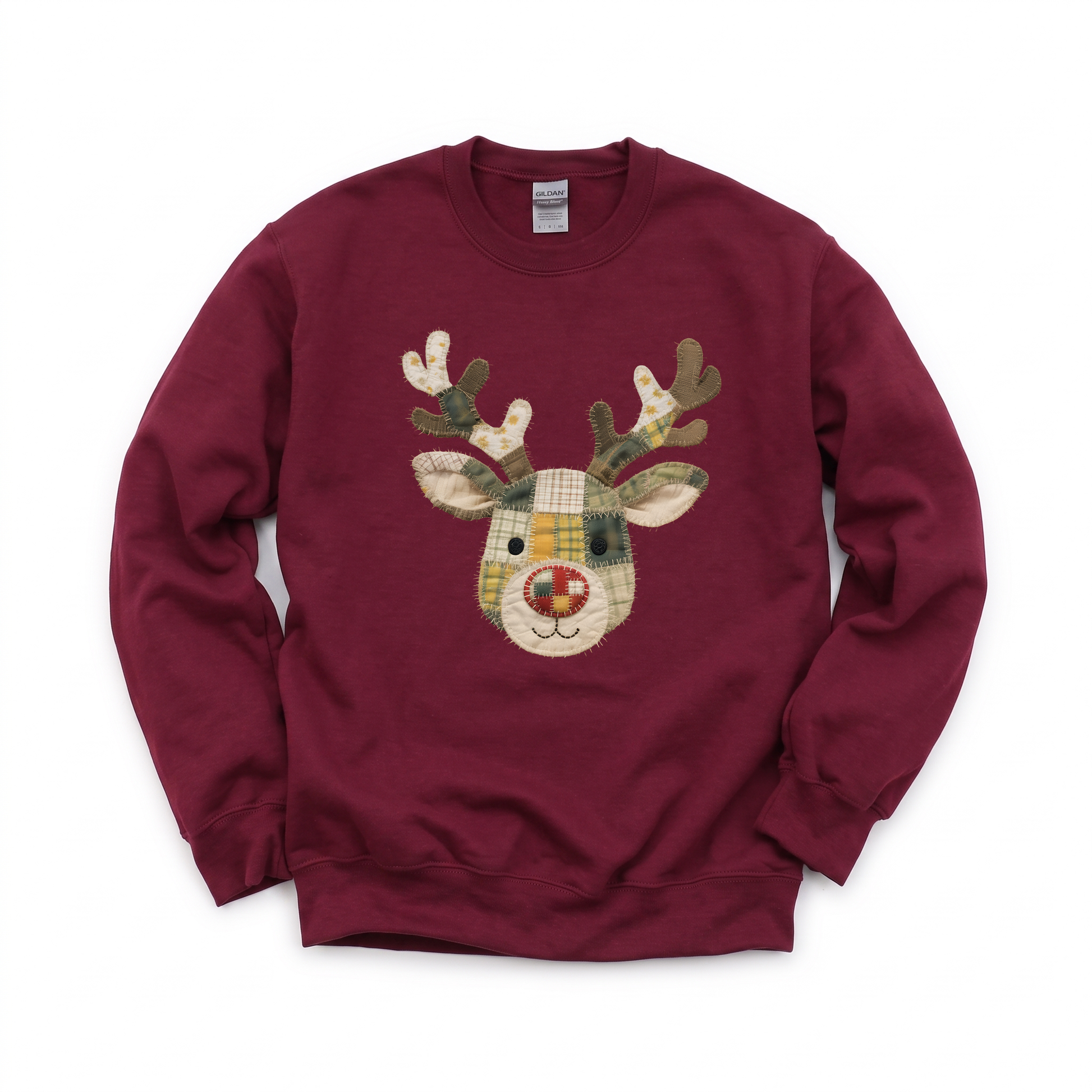 Patchwork Reindeer graphic on Gildan 18000B Youth Heavy Blend Sweatshirt in Maroon