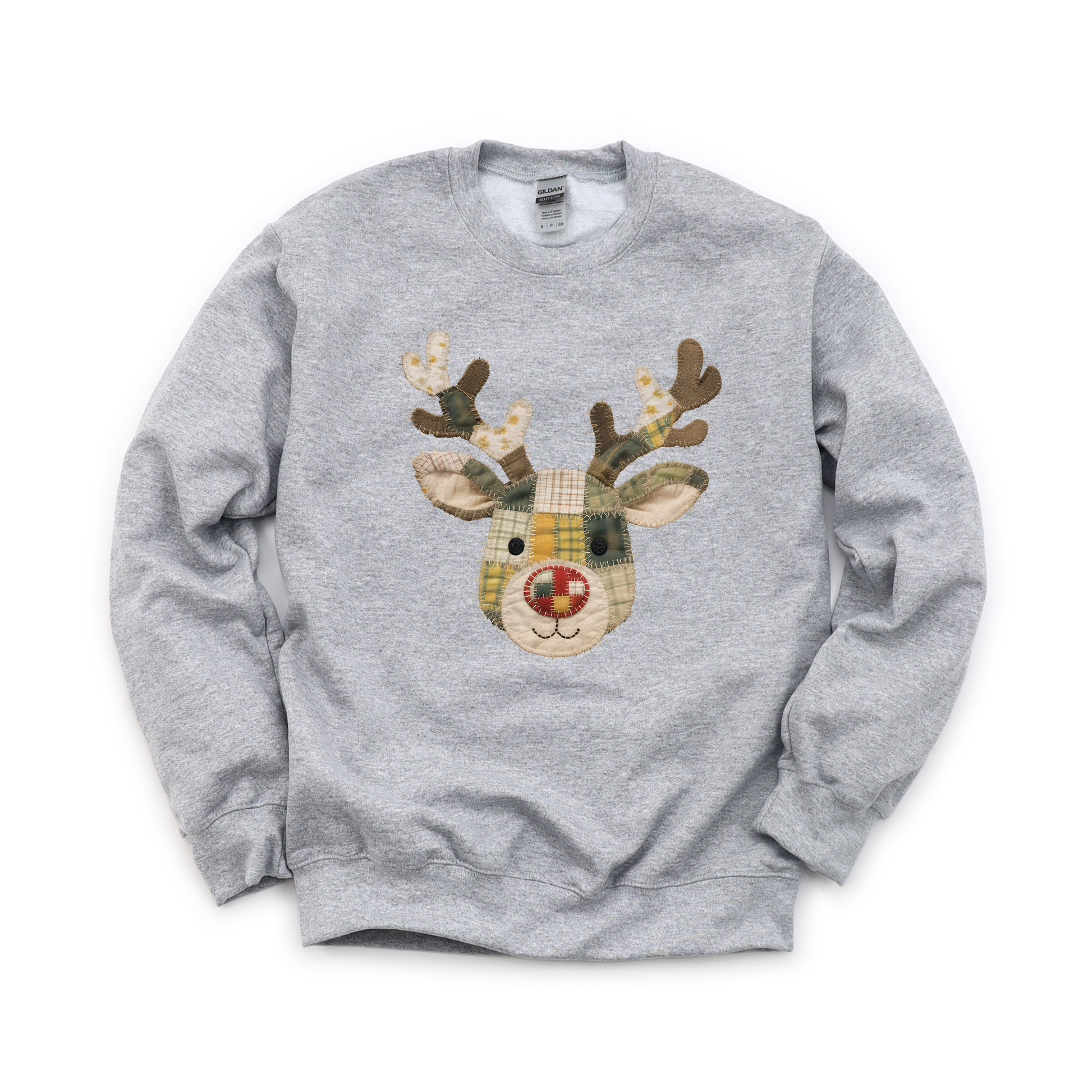 Patchwork Reindeer graphic on Gildan 18000B Youth Heavy Blend Sweatshirt in Sport Grey