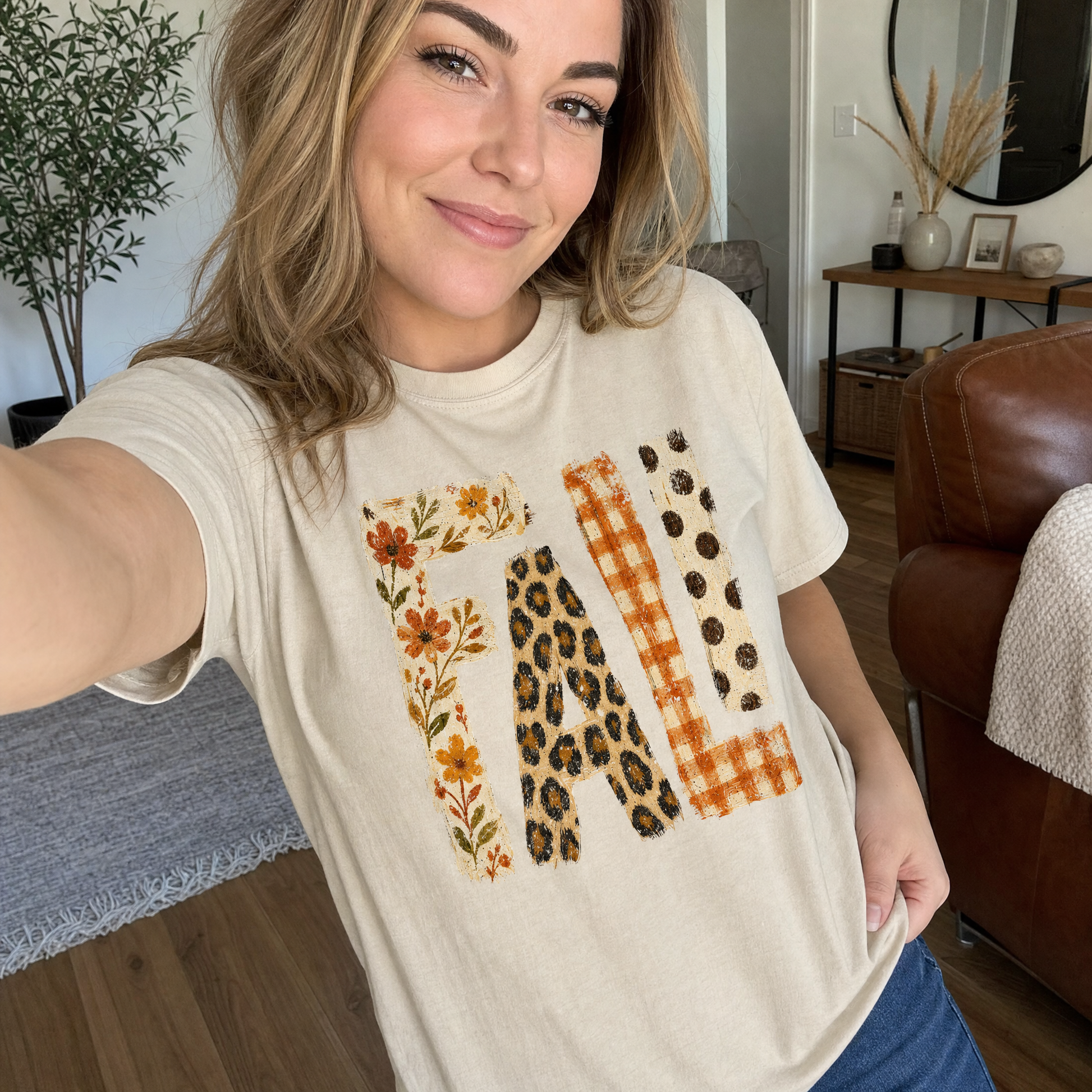 Model wearing the Patterned Fall comfort colors tee in Ivory