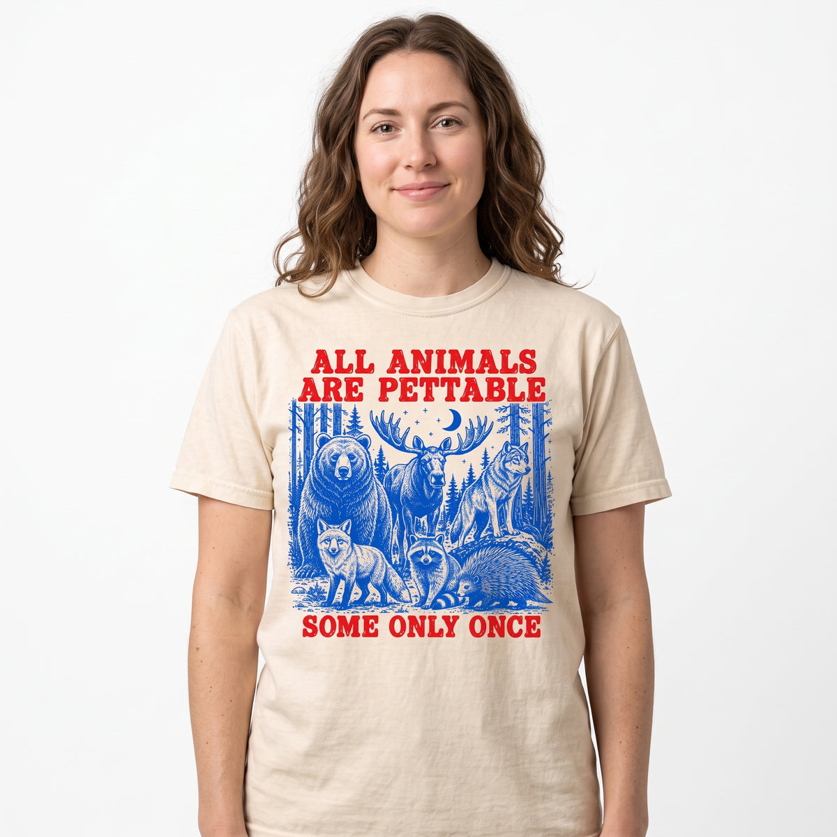 Model wearing the Pettable Animals comfort colors tee in Ivory, cover image 1