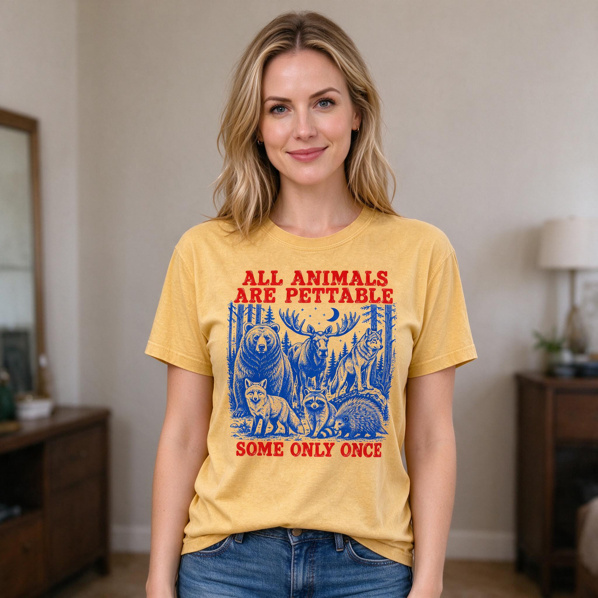 Model wearing the Pettable Animals comfort colors tee in Mustard