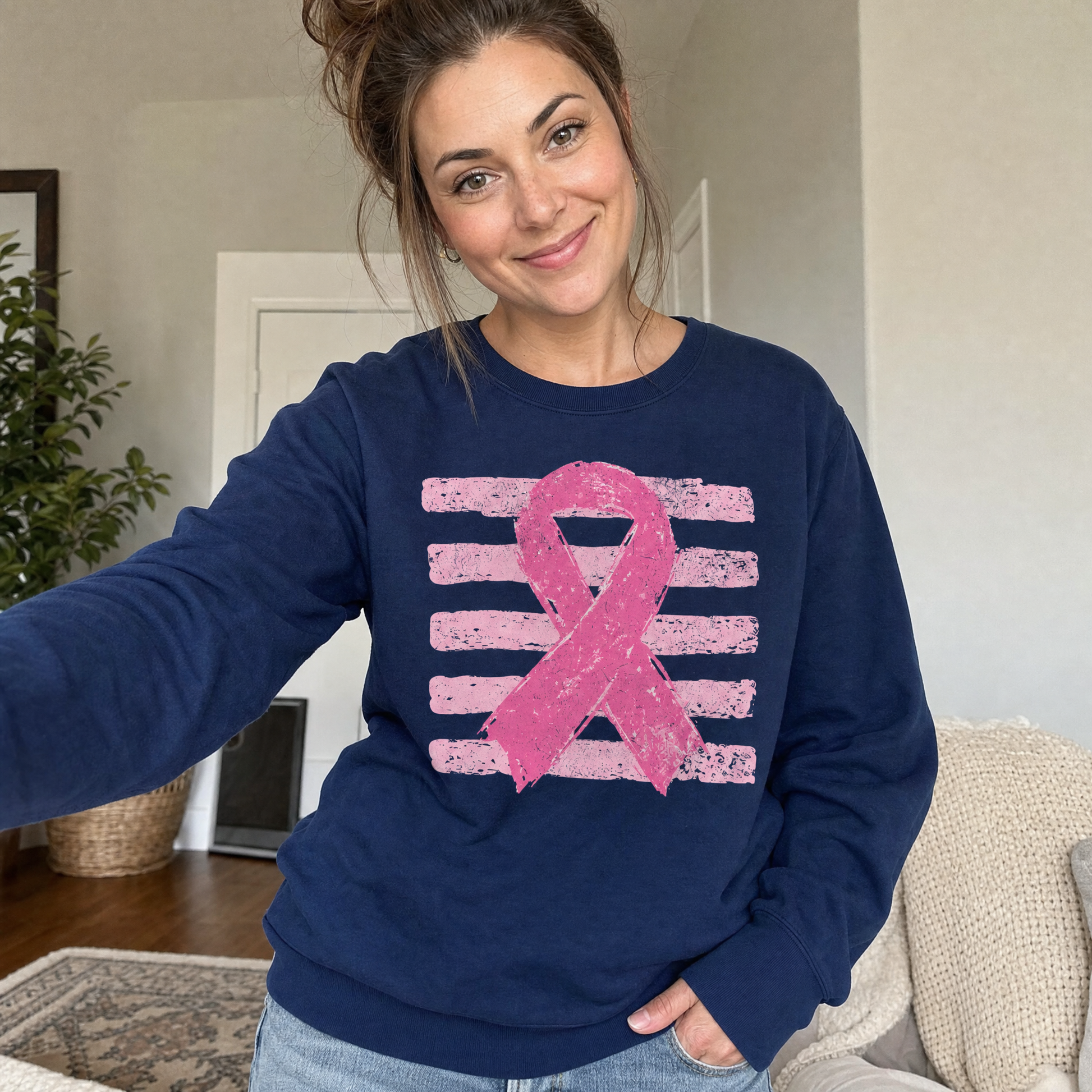 Model wearing the Pink Out sweatshirt in Navy, lifestyle image 1