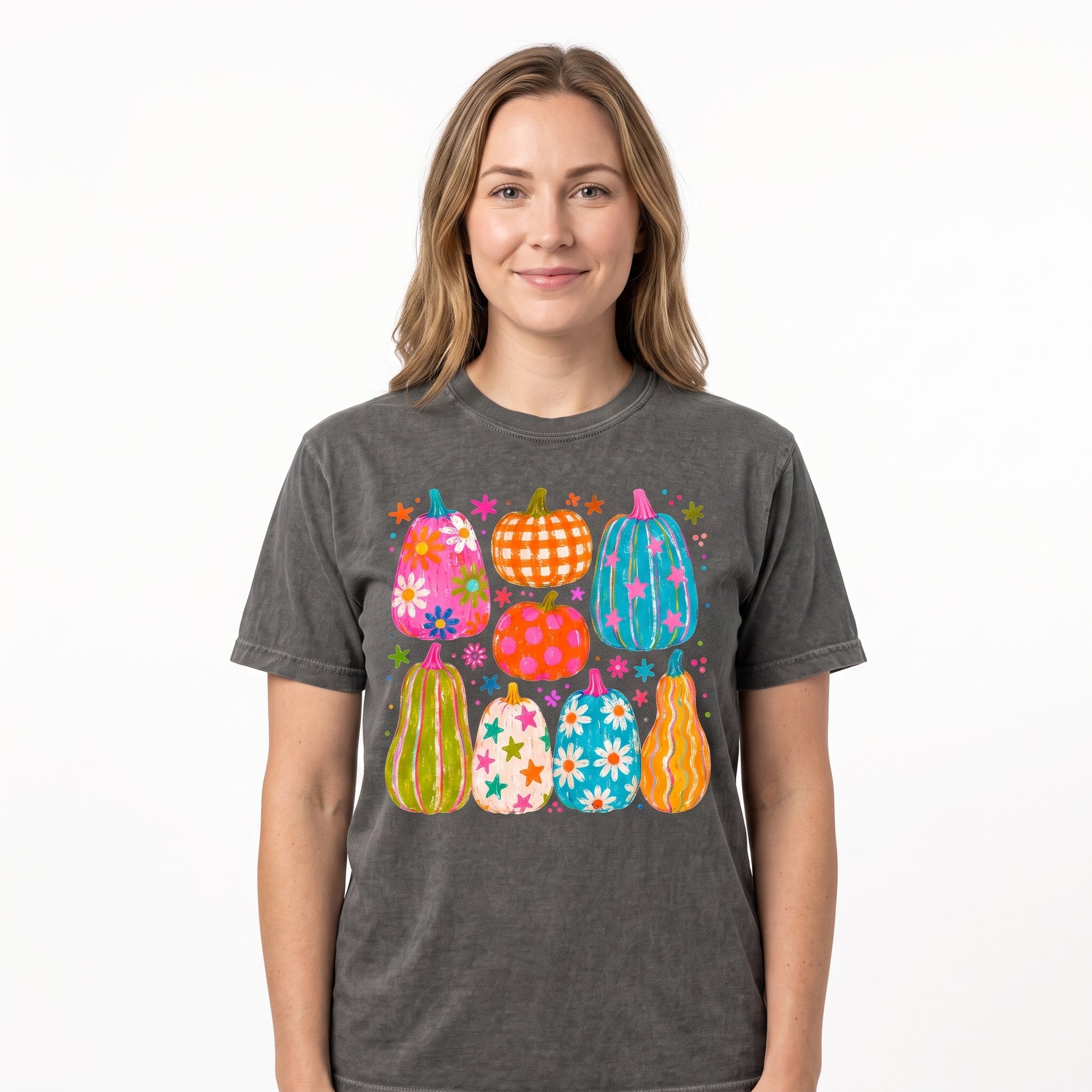 Model wearing the Playful Pumpkins comfort colors tee in Pepper
