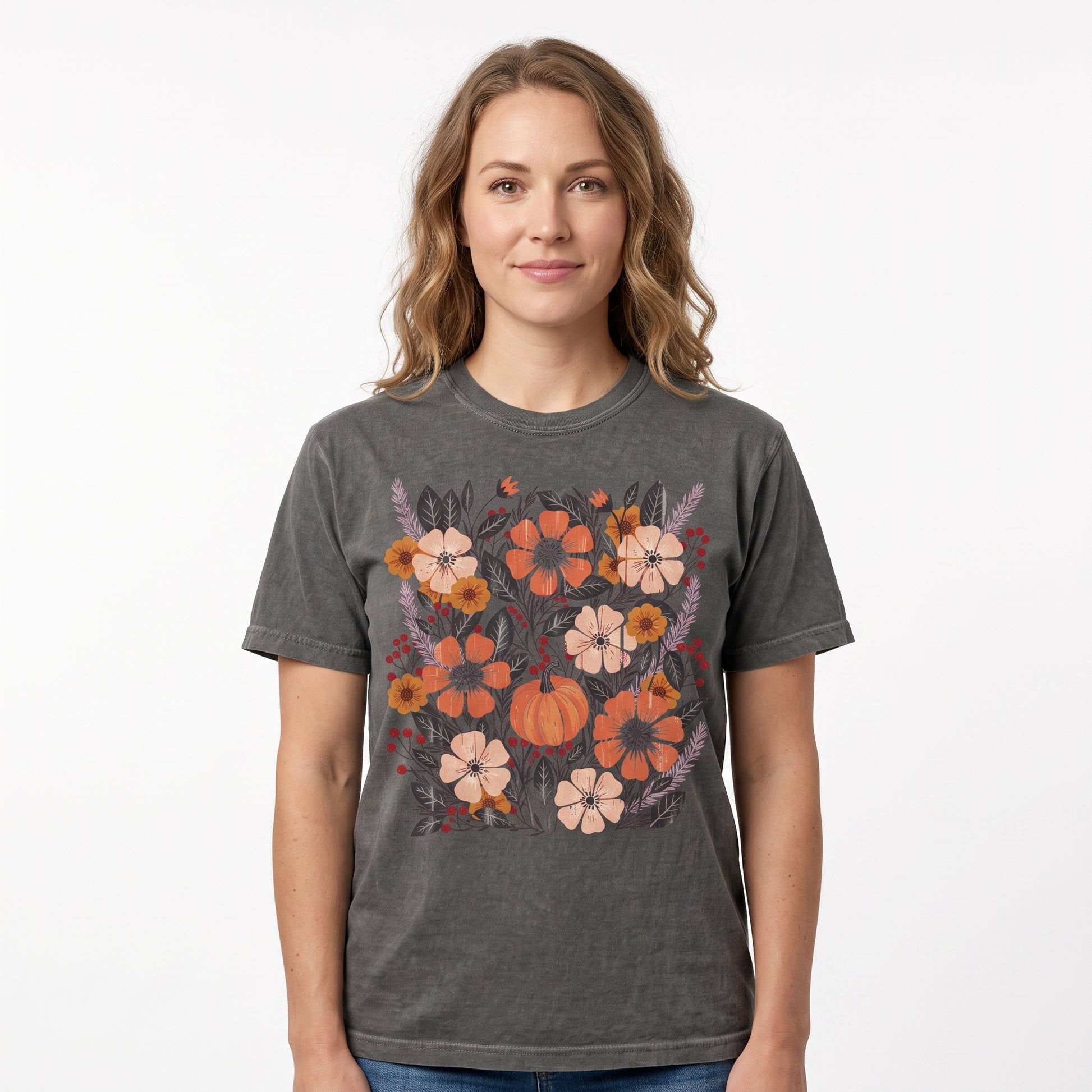 Model wearing the Pumpkin Patch Blooms comfort colors tee in Pepper
