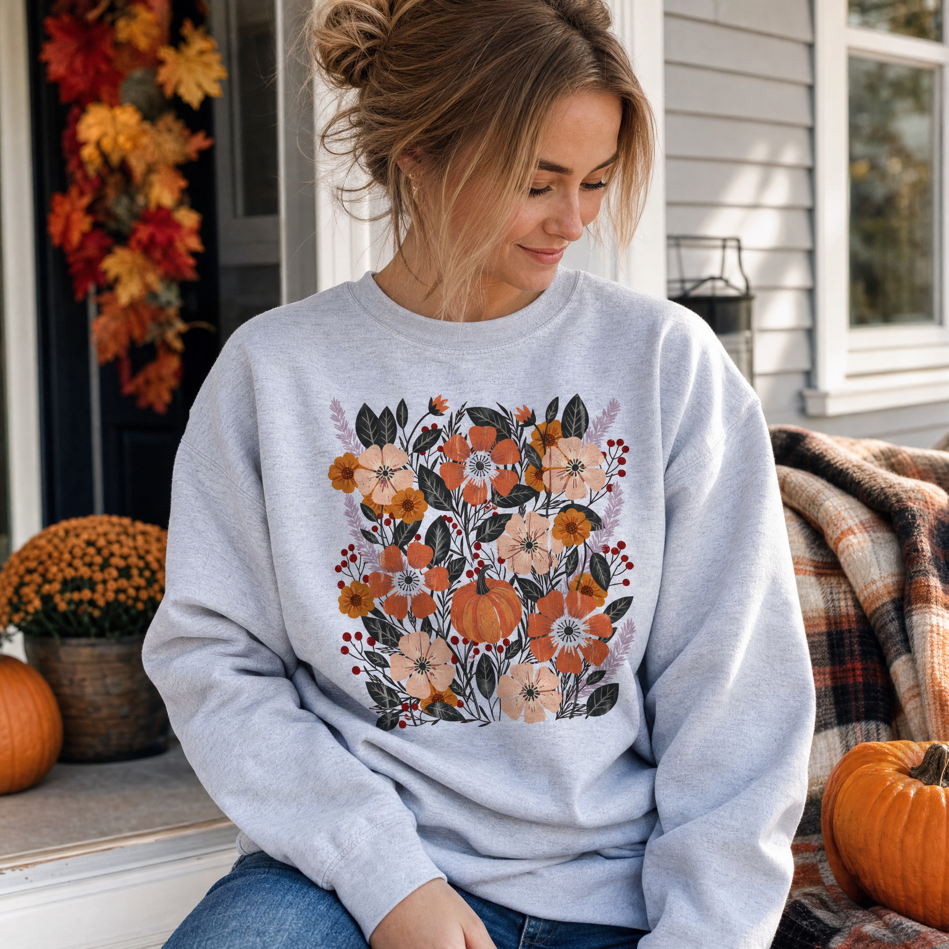 Model wearing the Pumpkin Patch Blooms sweatshirt in Ash