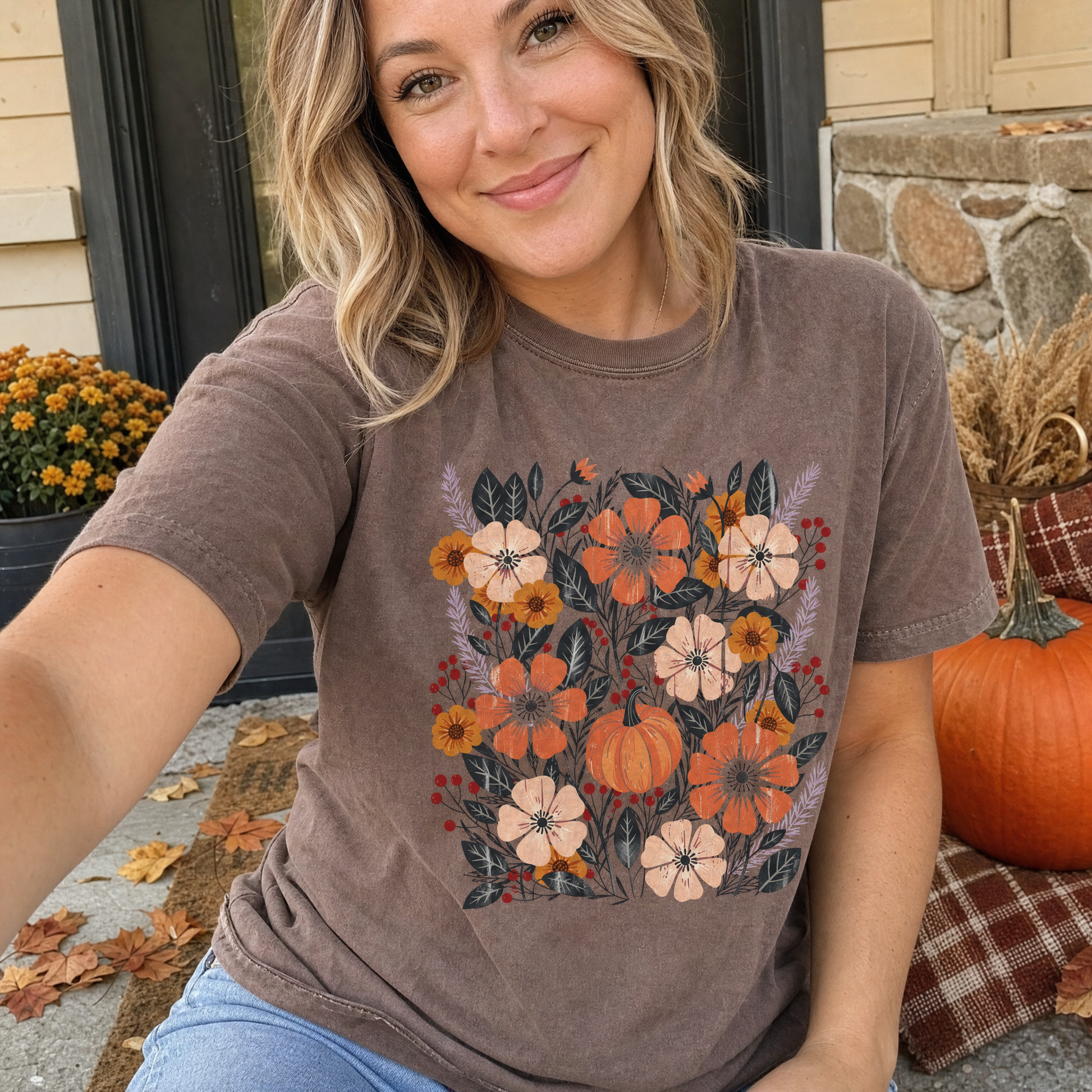 Model wearing the Pumpkin Patch Blooms comfort colors tee in Espresso