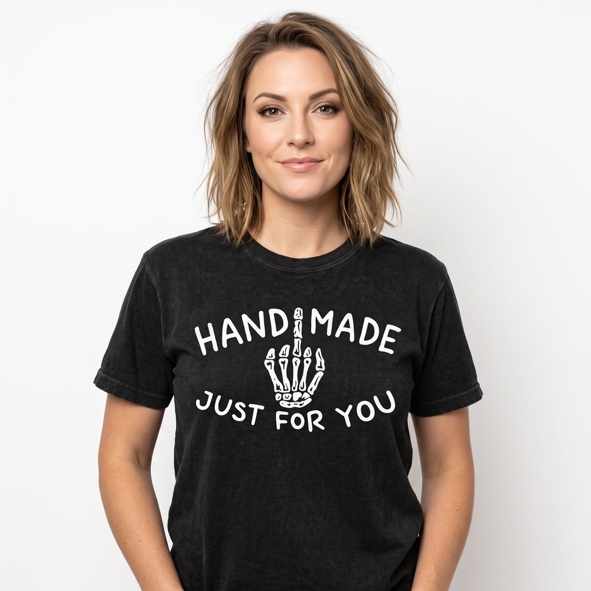Model wearing the Skeleton Middle Finger comfort colors tee in Black, cover image 1