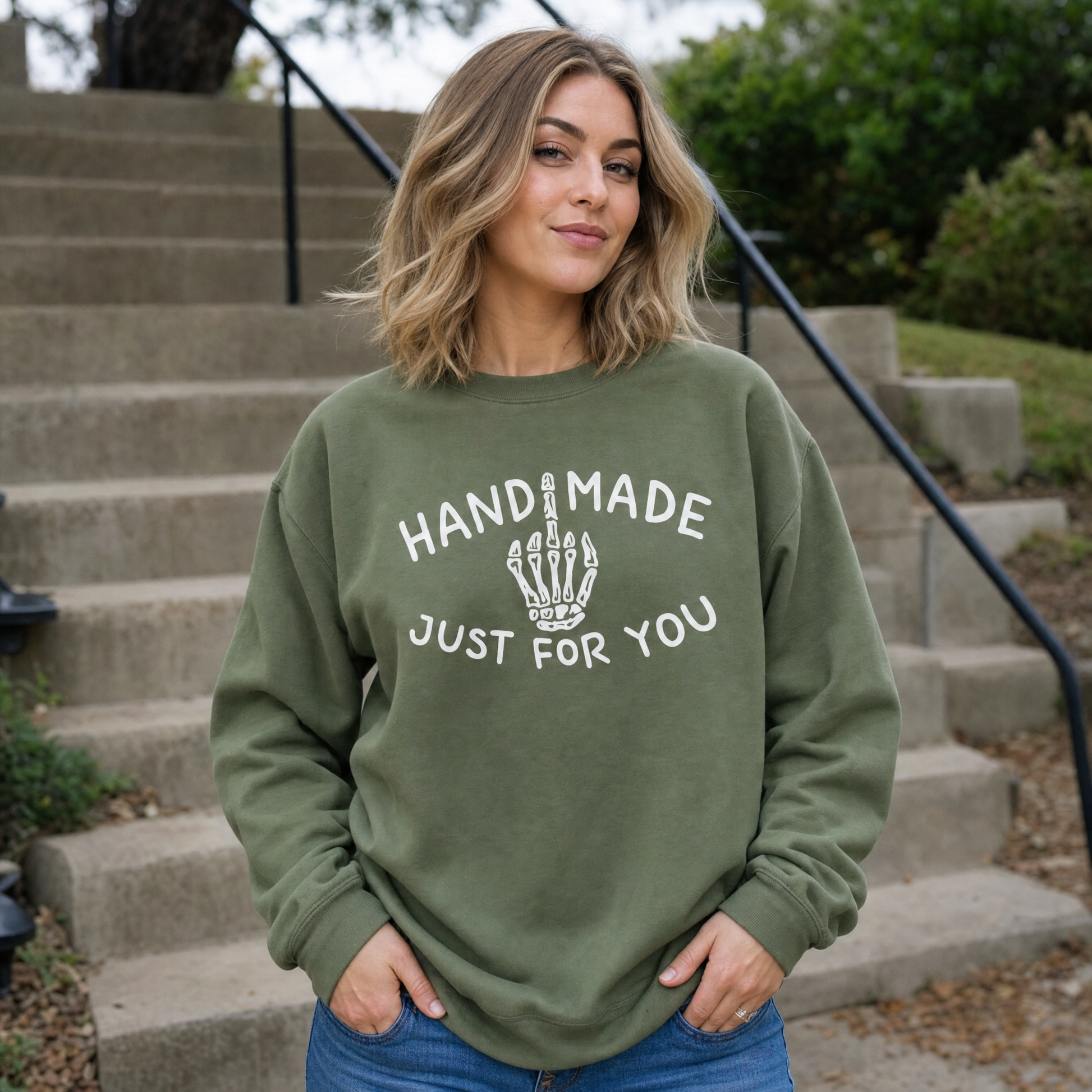 Model wearing the Skeleton Middle Finger sweatshirt in Military Green
