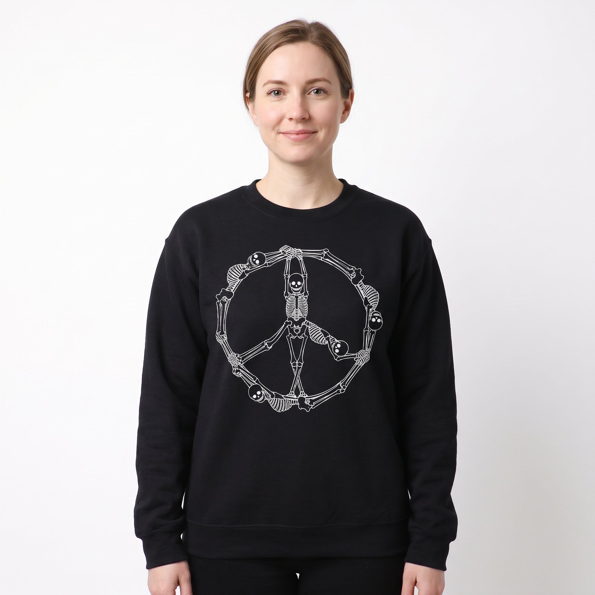 Model wearing the Skeleton Peace Sign sweatshirt in Black, cover image 1