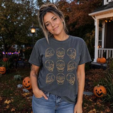 Model wearing the Skull Pattern comfort colors tee in Pepper