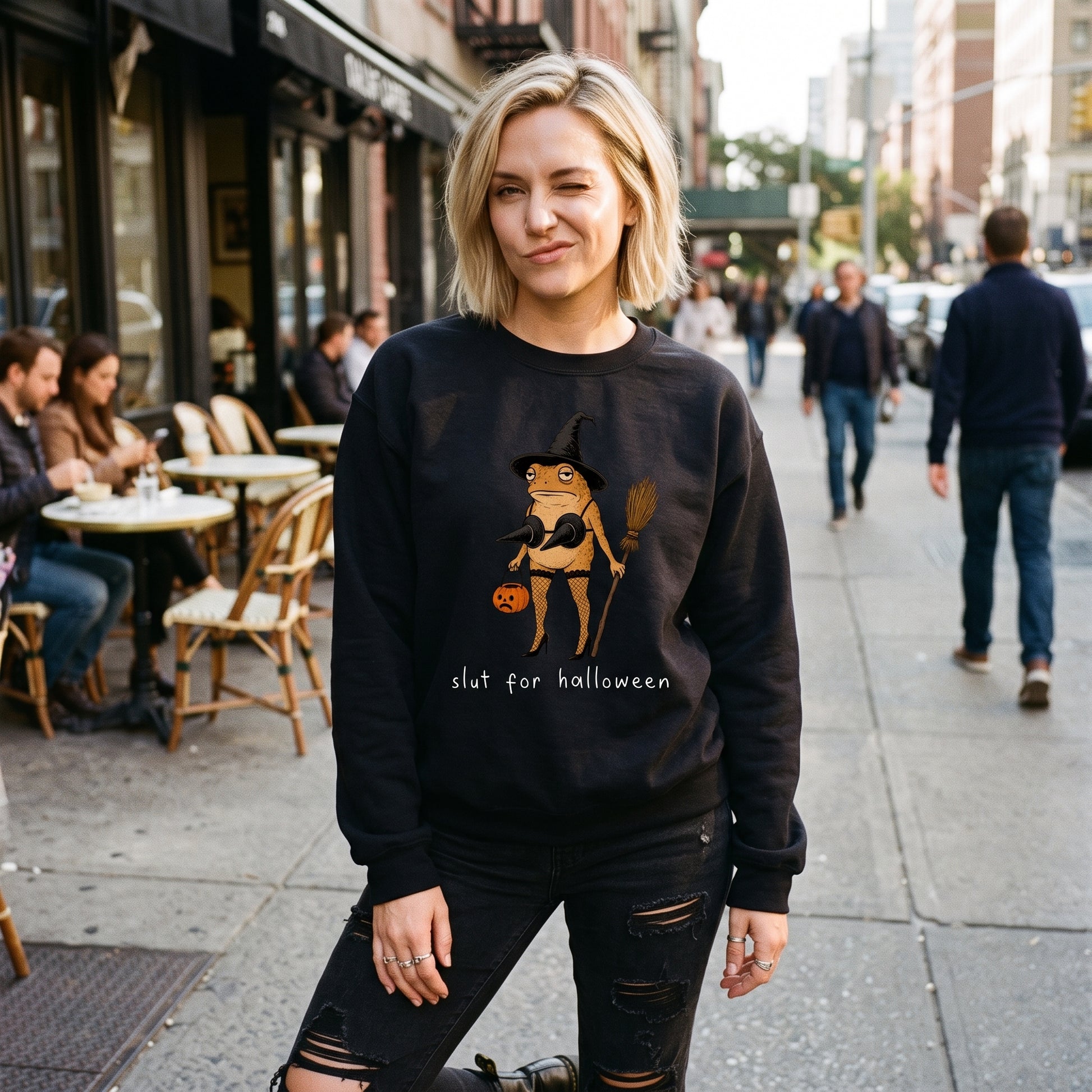 Model wearing the Slut For Halloween sweatshirt in Black