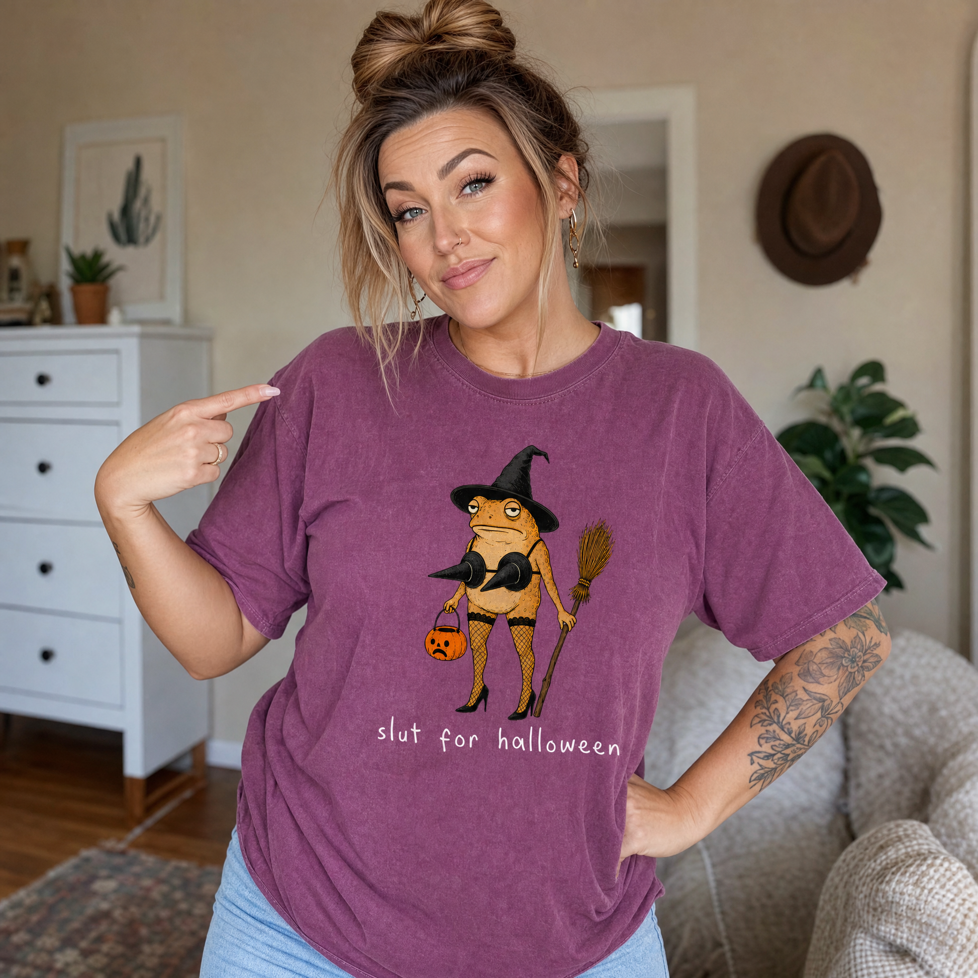 Model wearing the Slut For Halloween comfort colors tee in Berry
