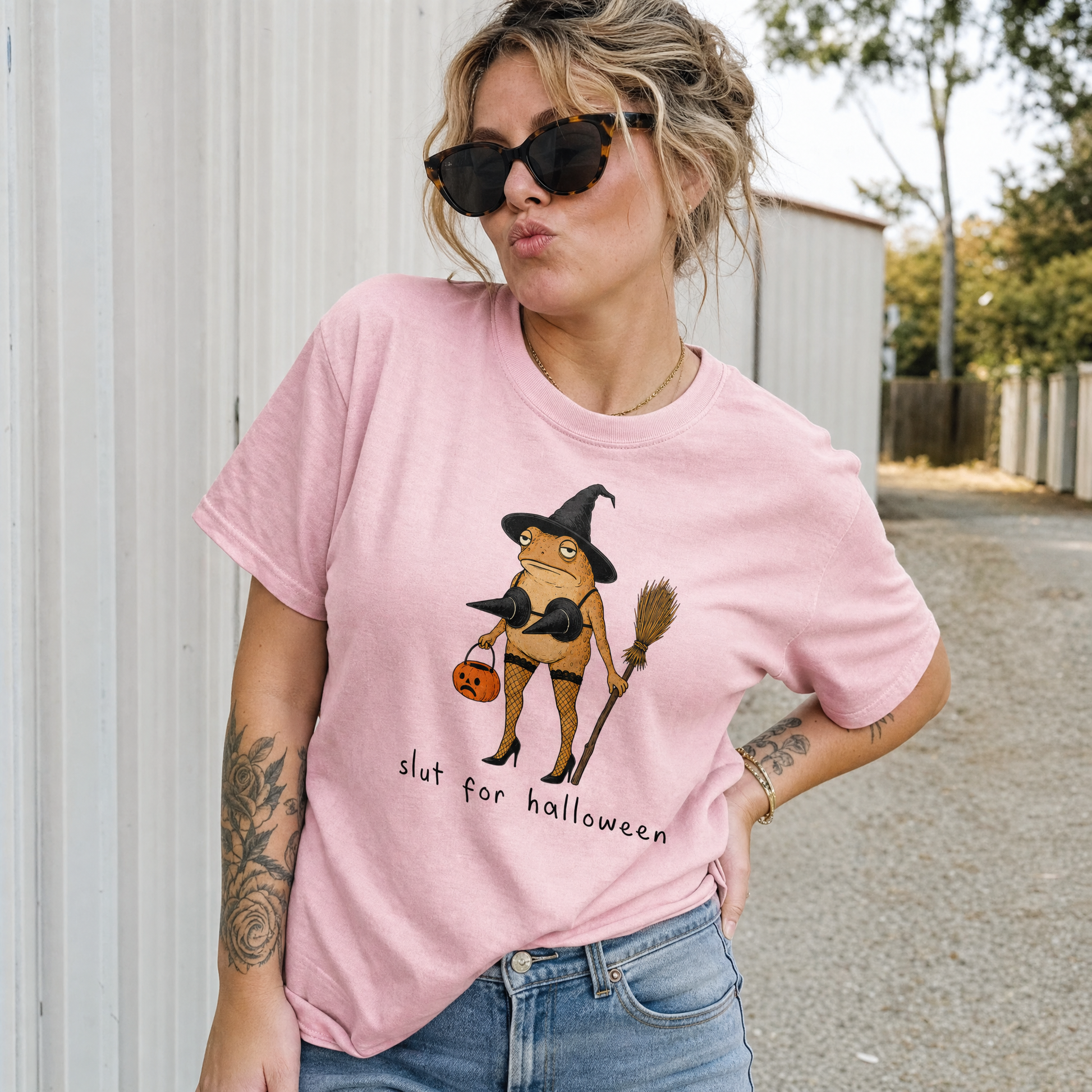 Model wearing the Slut For Halloween comfort colors tee in Blossom