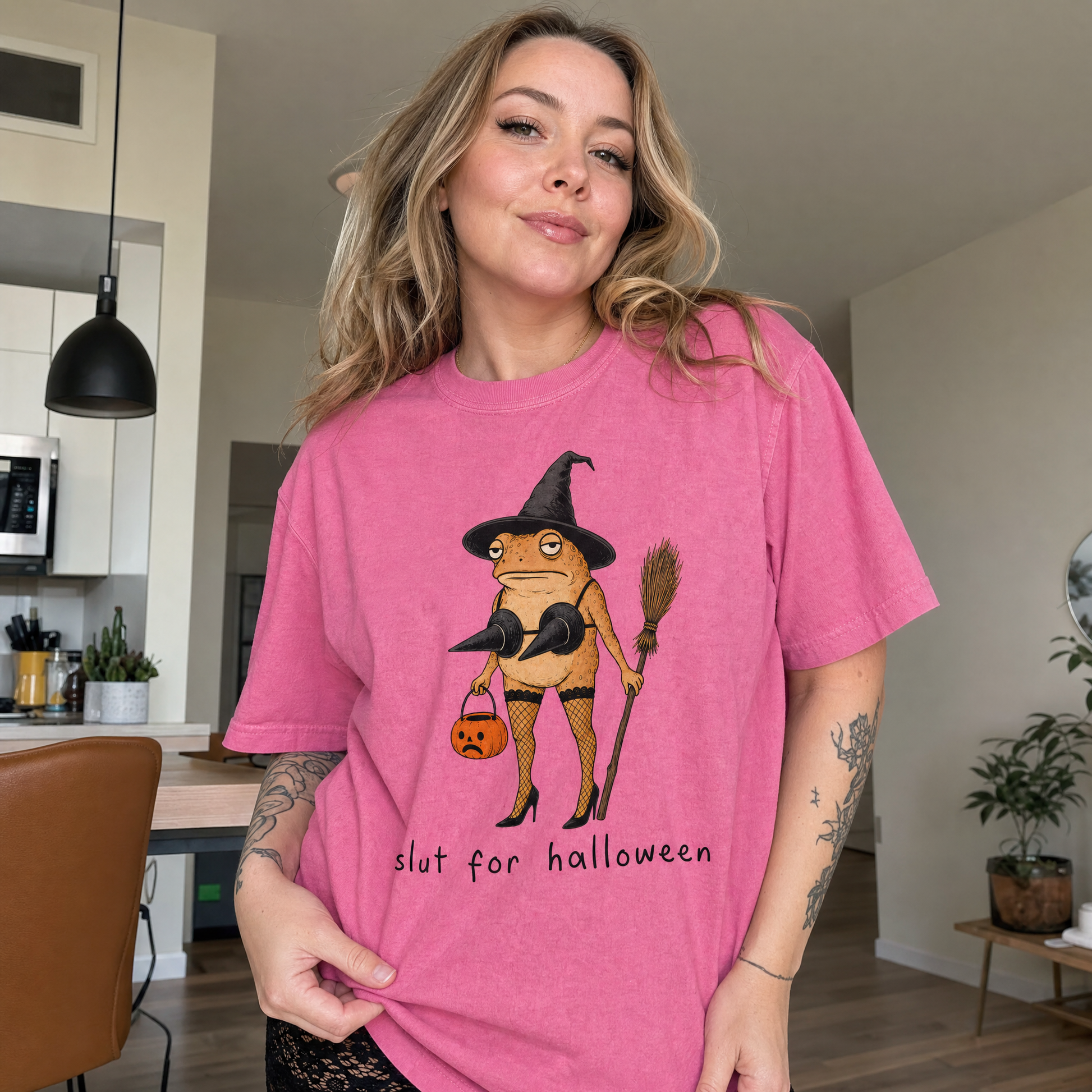 Model wearing the Slut For Halloween comfort colors tee in Crunchberry