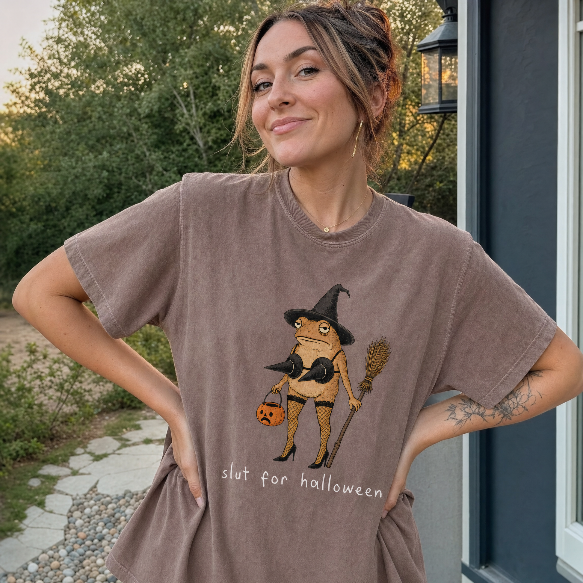 Model wearing the Slut For Halloween comfort colors tee in Espresso