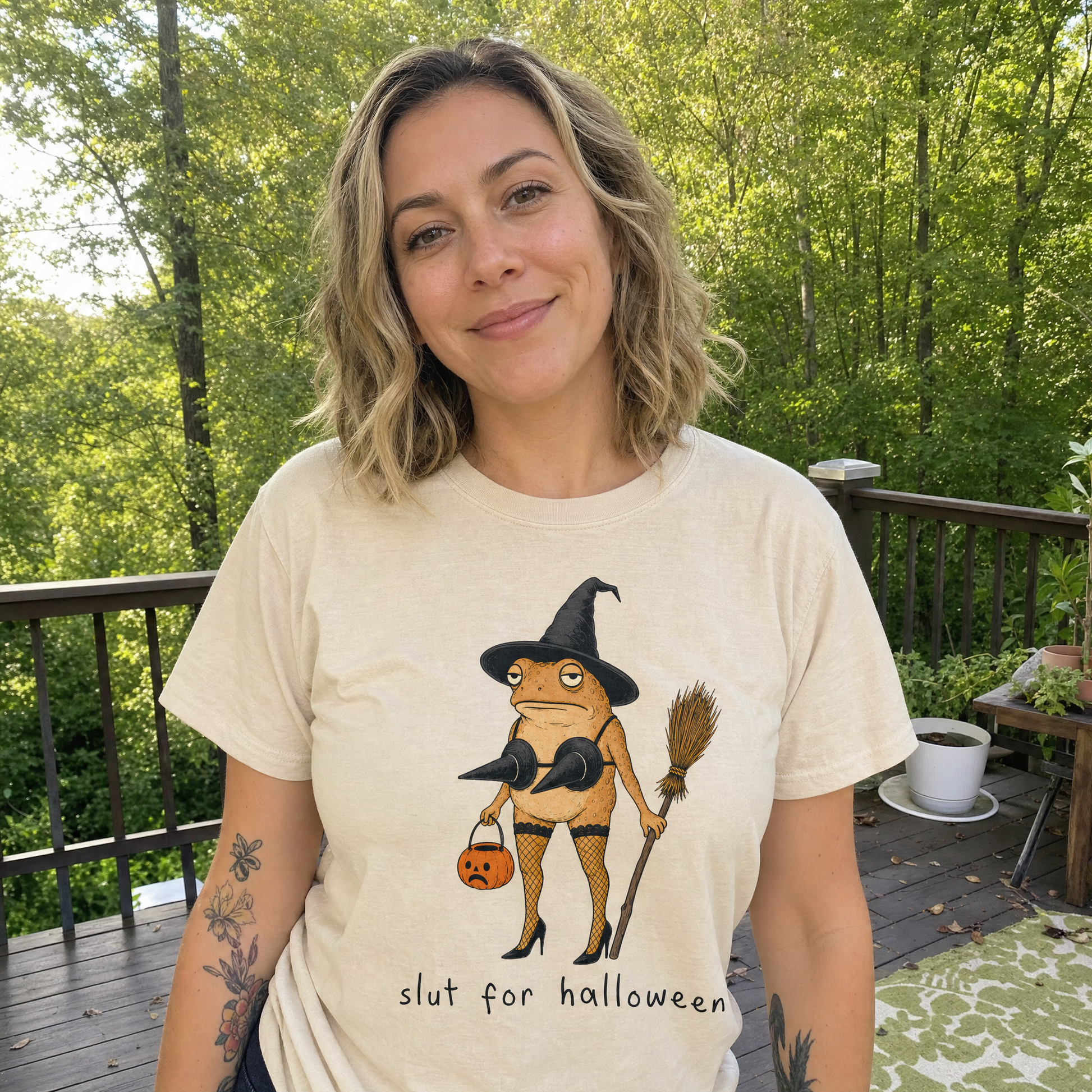 Model wearing the Slut For Halloween comfort colors tee in Ivory