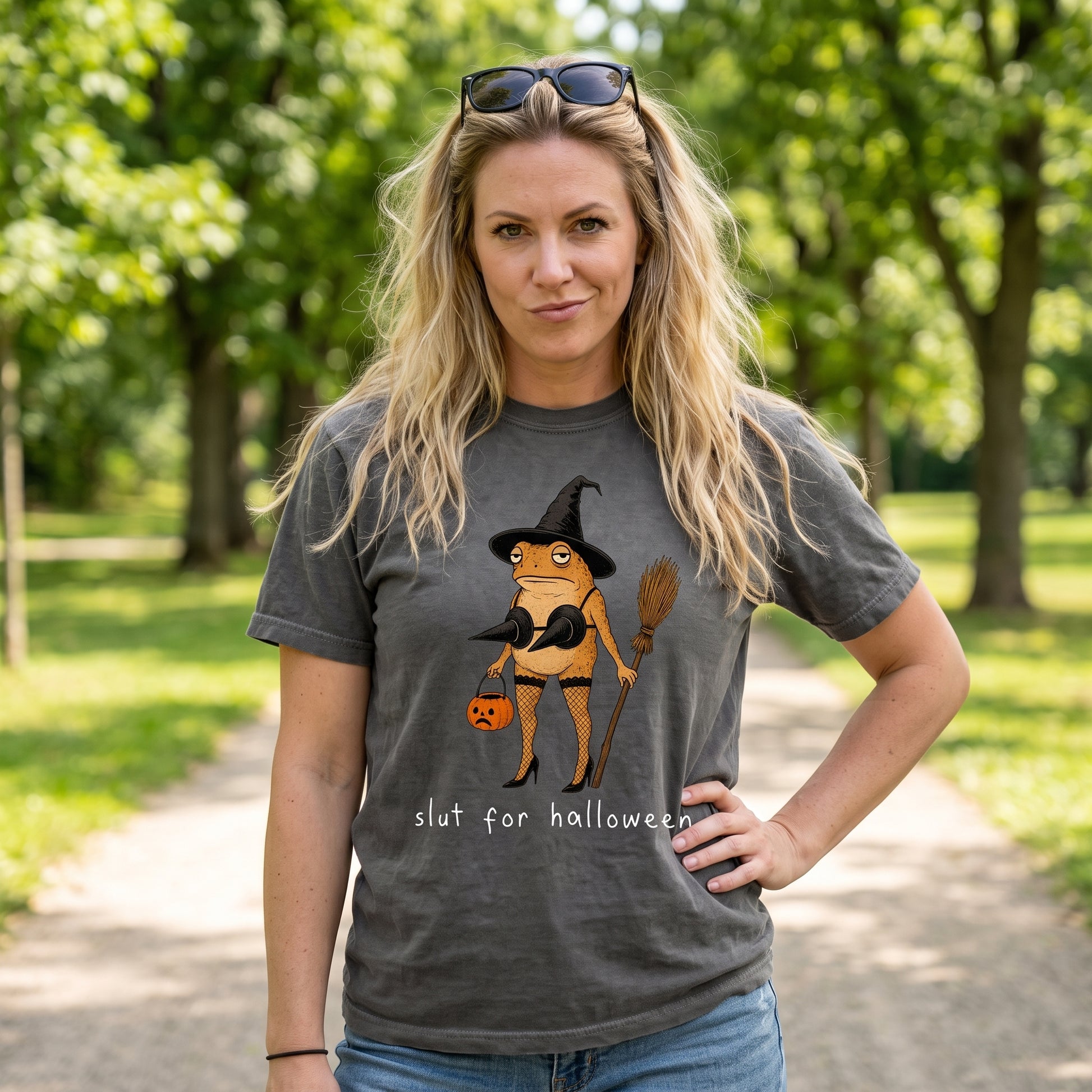 Model wearing the Slut For Halloween comfort colors tee in Pepper, lifestyle image 1