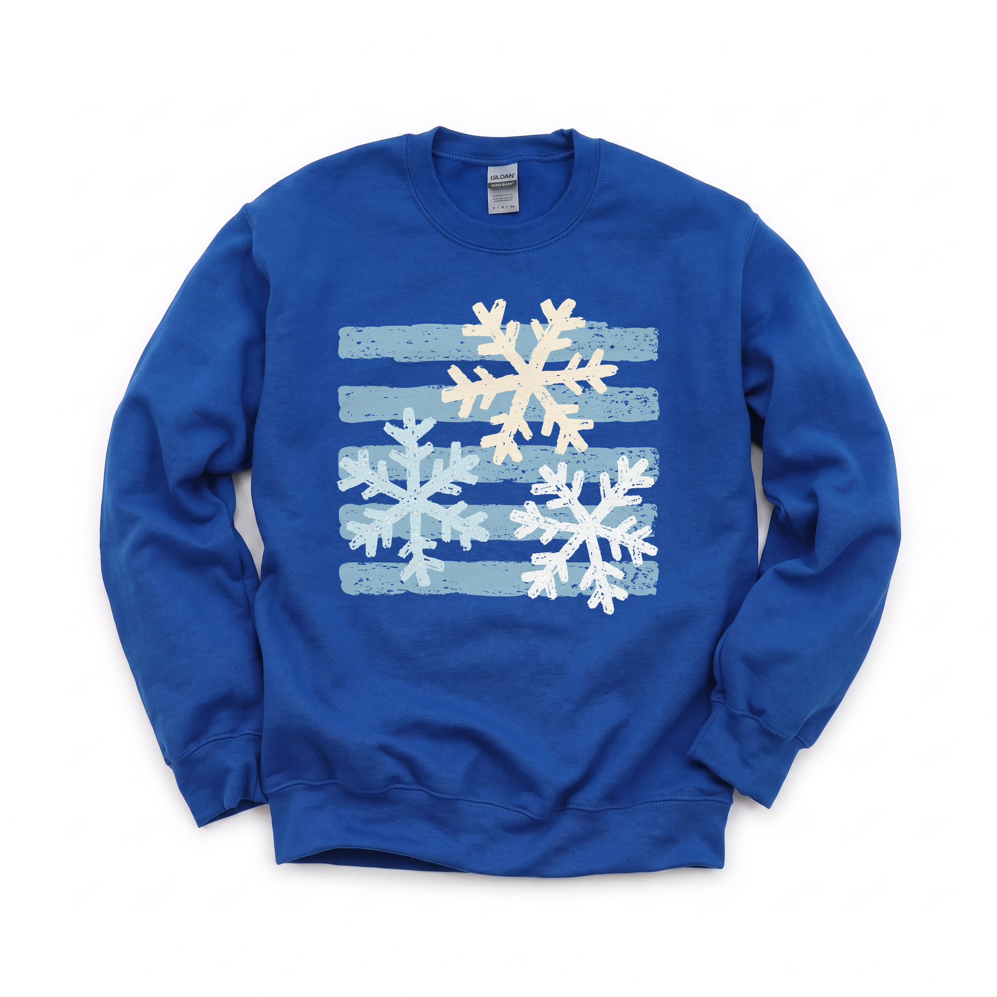 Snowflakes graphic on Gildan 18000B Youth Heavy Blend Sweatshirt in Royal