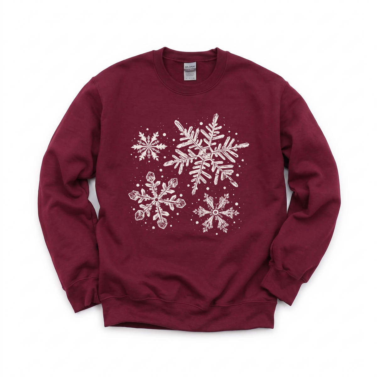 Snowflakes graphic on Gildan 18000 in Maroon