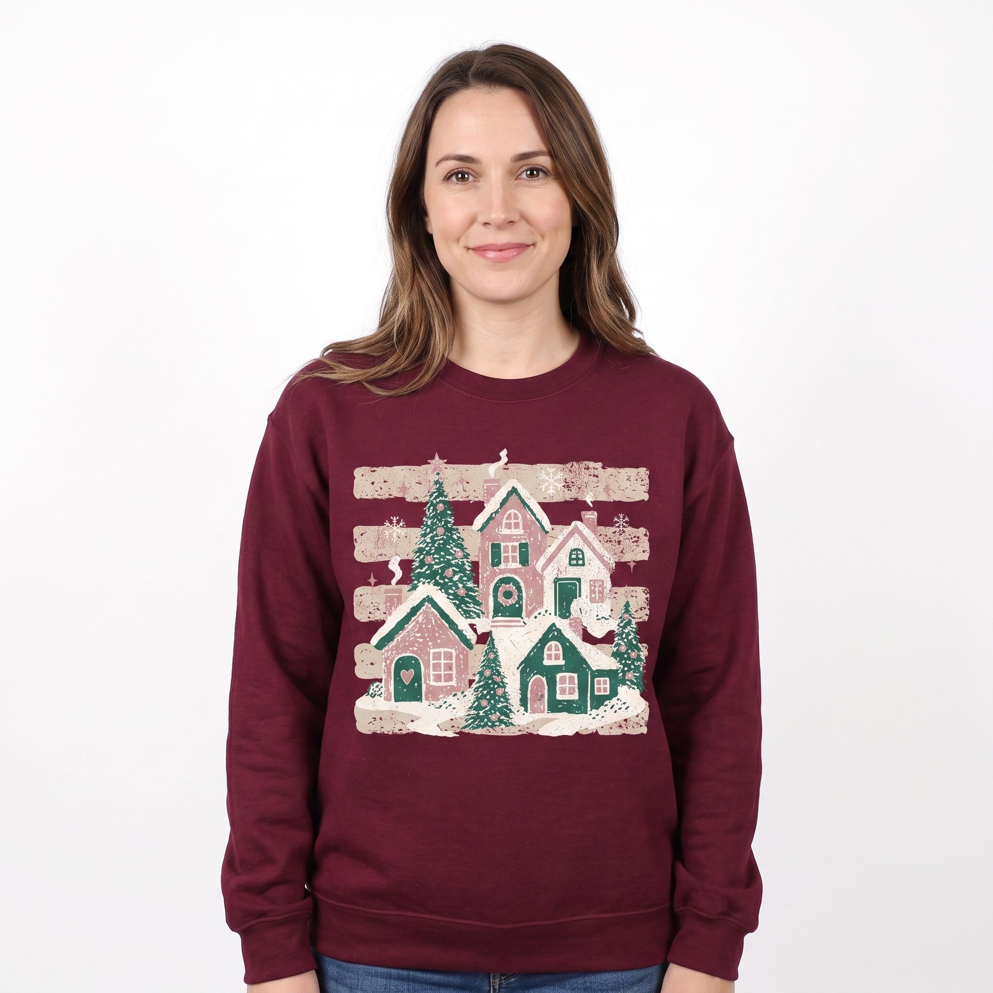 Model wearing the Snowy Christmas Village sweatshirt in Maroon, cover image 1