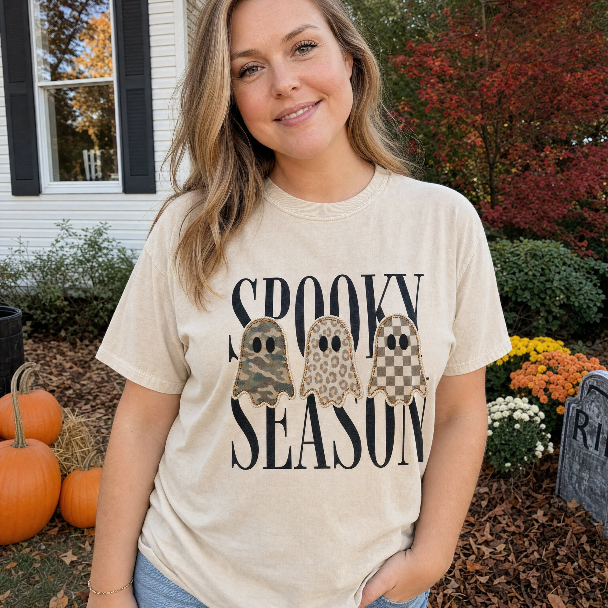 Model wearing the Spooky Season Ghosts comfort colors tee in Ivory