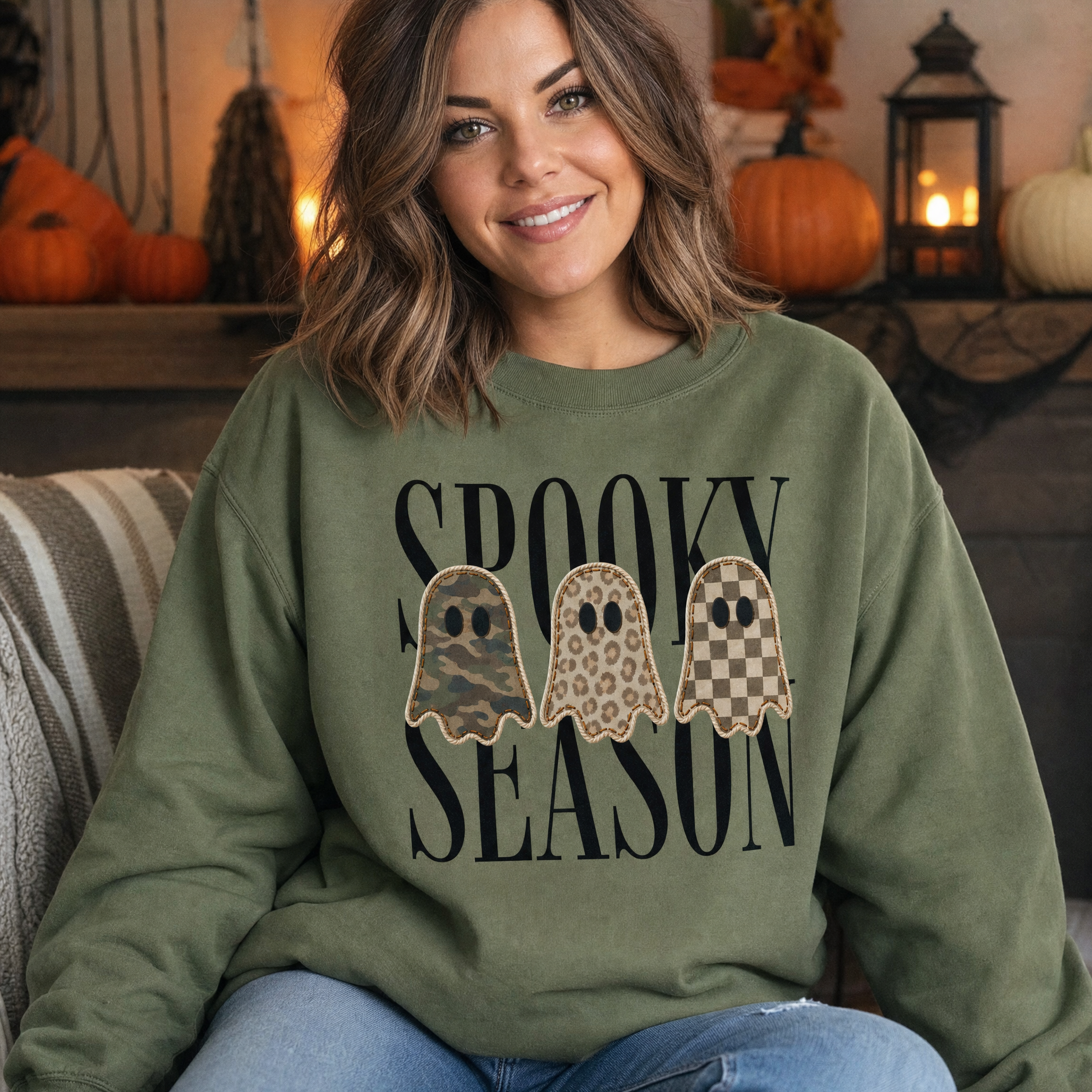 Model wearing the Spooky Season Ghosts sweatshirt in Military Green