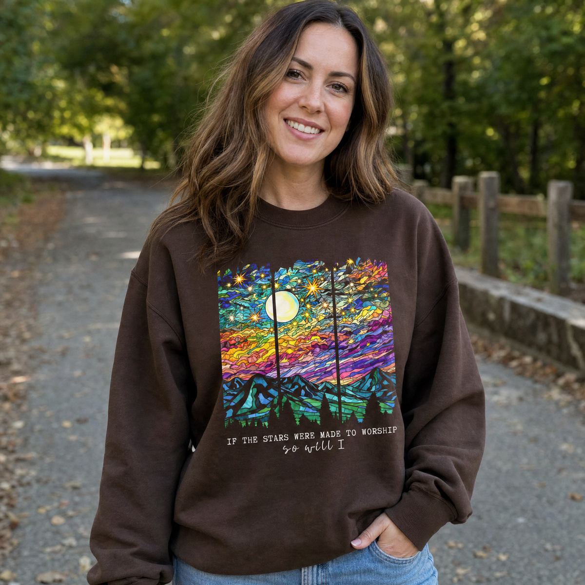 Model wearing the Stained Glass Mountain Night sweatshirt in Dark Chocolate