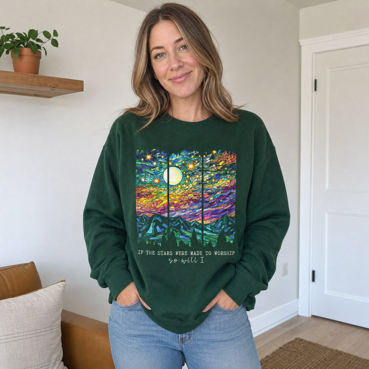 Model wearing the Stained Glass Mountain Night sweatshirt in Forest Green, lifestyle image 1