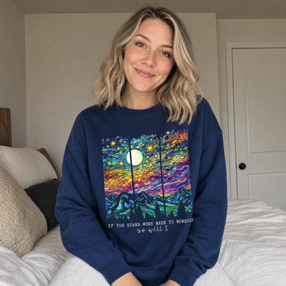 Model wearing the Stained Glass Mountain Night sweatshirt in Navy