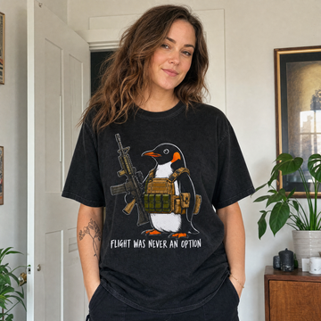 Model wearing the Tactical Penguin comfort colors tee in Black, lifestyle image 1