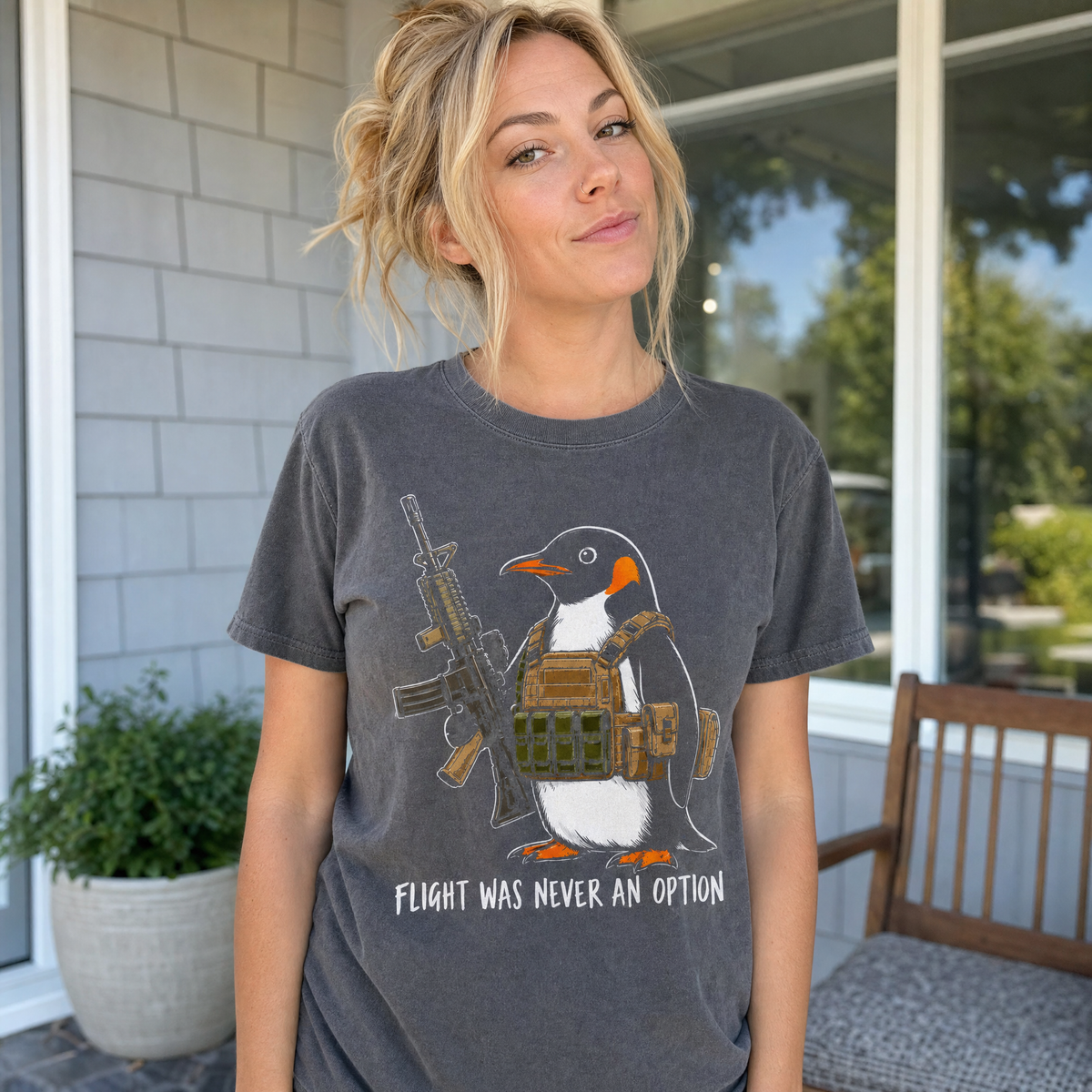 Model wearing the Tactical Penguin comfort colors tee in Pepper