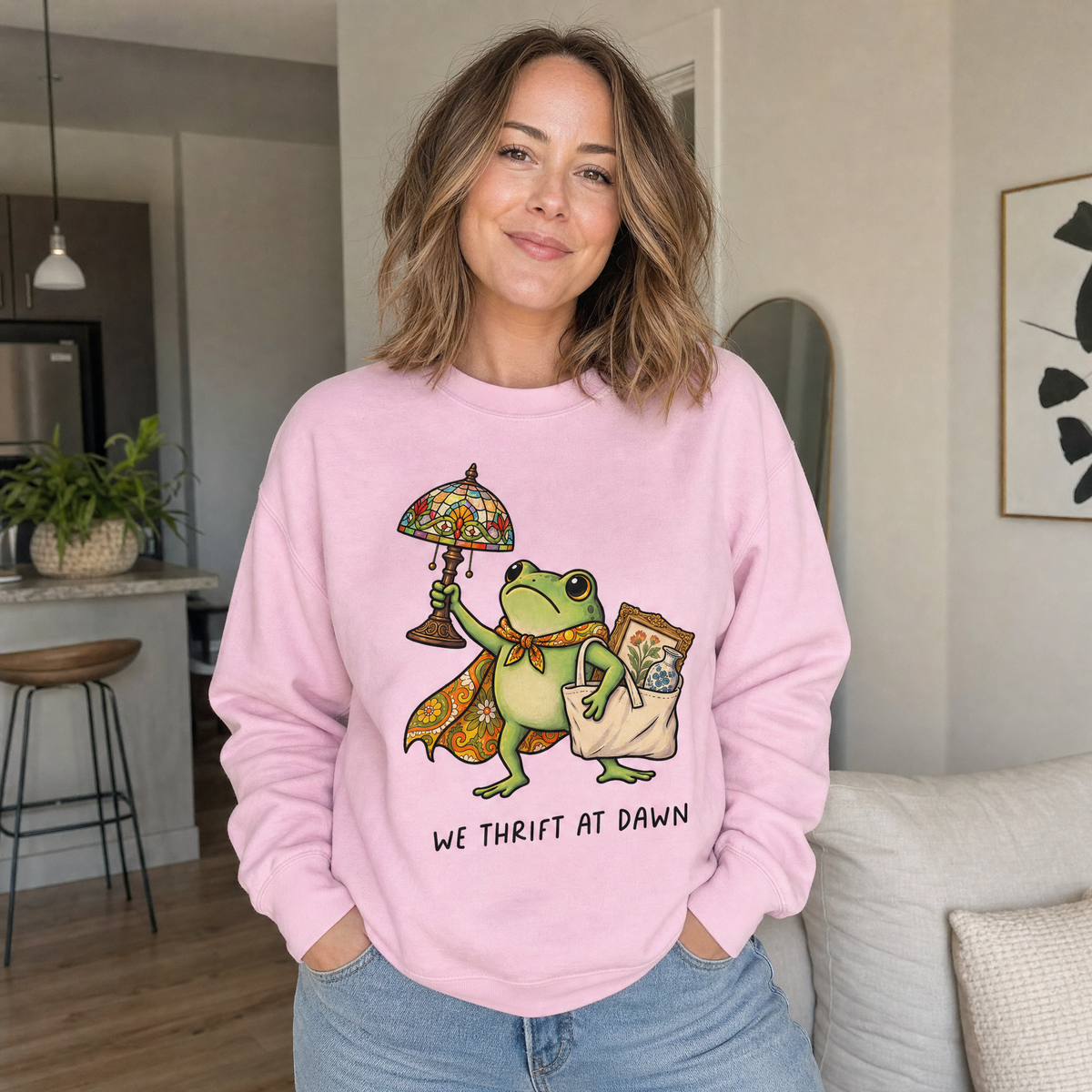 Model wearing the Thrifting Frog sweatshirt in Light Pink