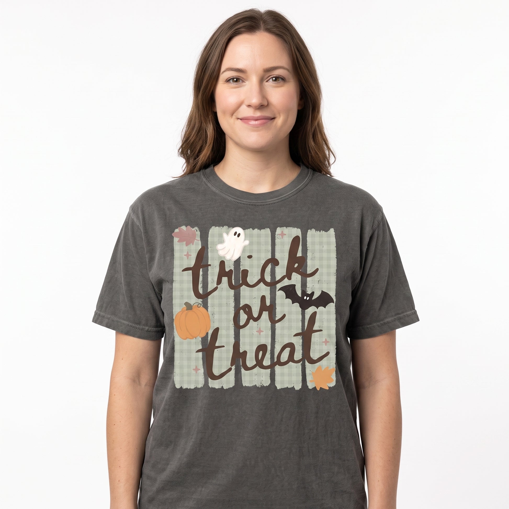 Model wearing the Trick or Treat comfort colors tee in Pepper