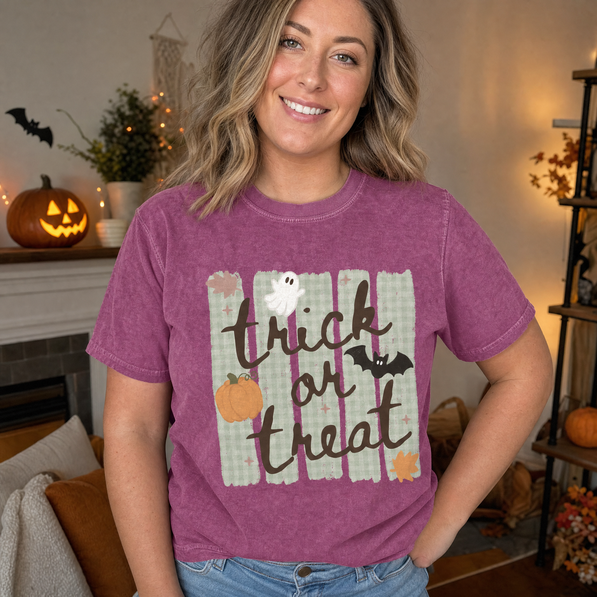 Model wearing the Trick or Treat comfort colors tee in Berry