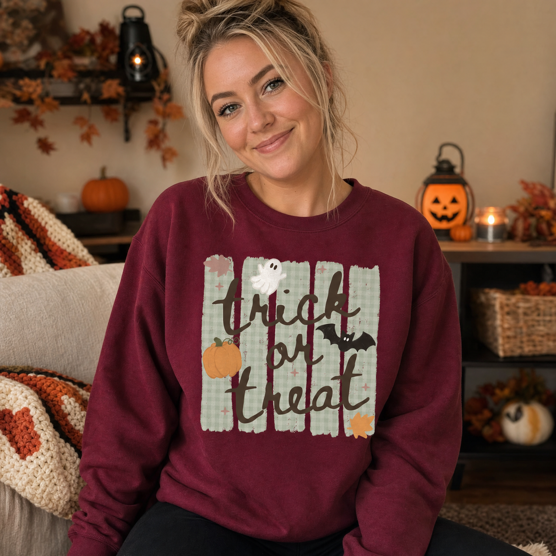 Model wearing the Trick or Treat sweatshirt in Maroon