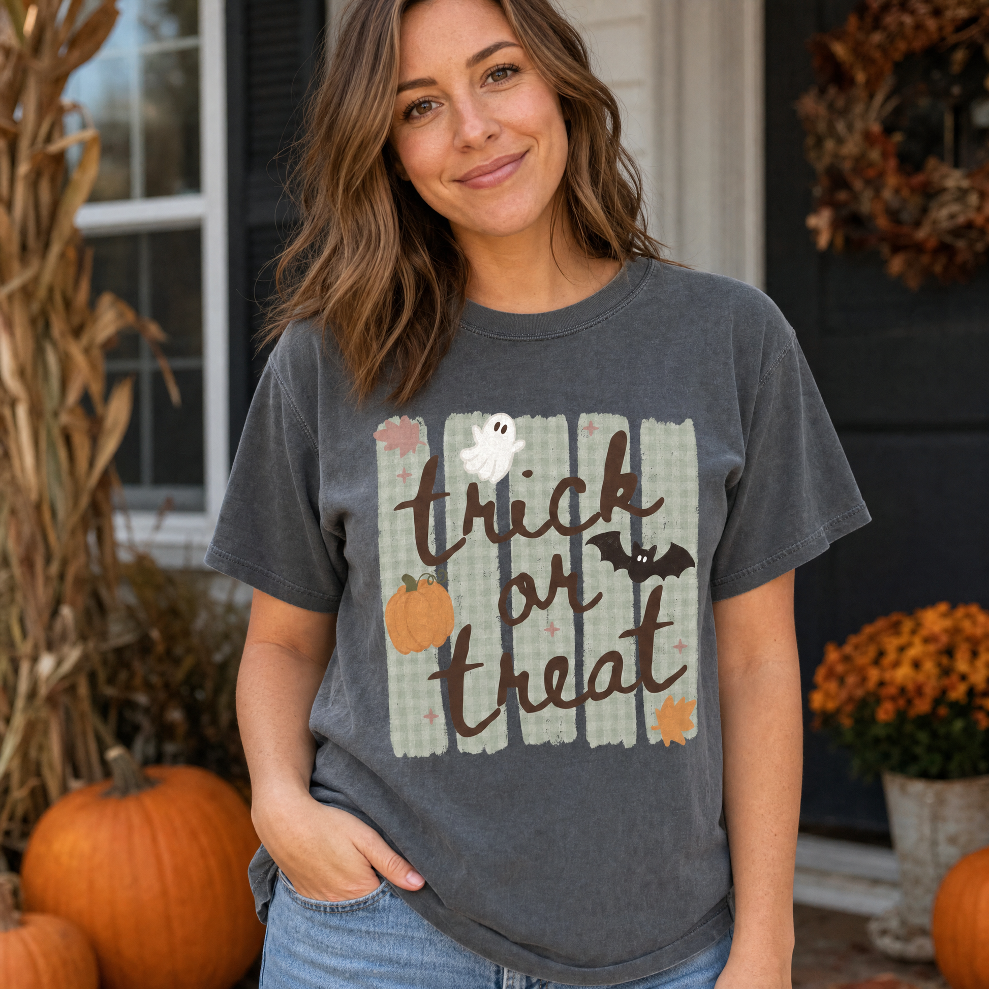 Model wearing the Trick or Treat comfort colors tee in Pepper