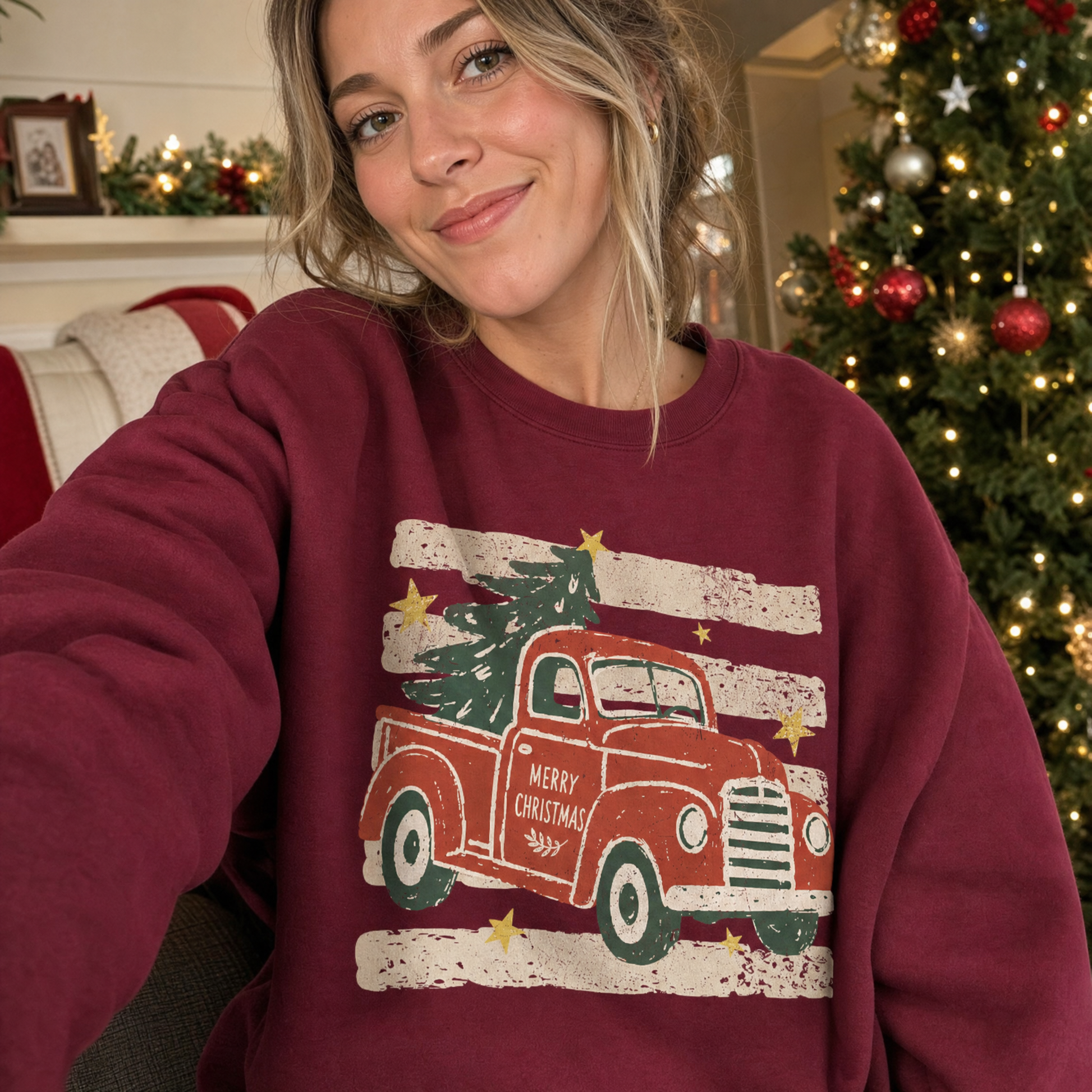 Model wearing the Vintage Christmas Truck sweatshirt in Maroon, lifestyle image 1