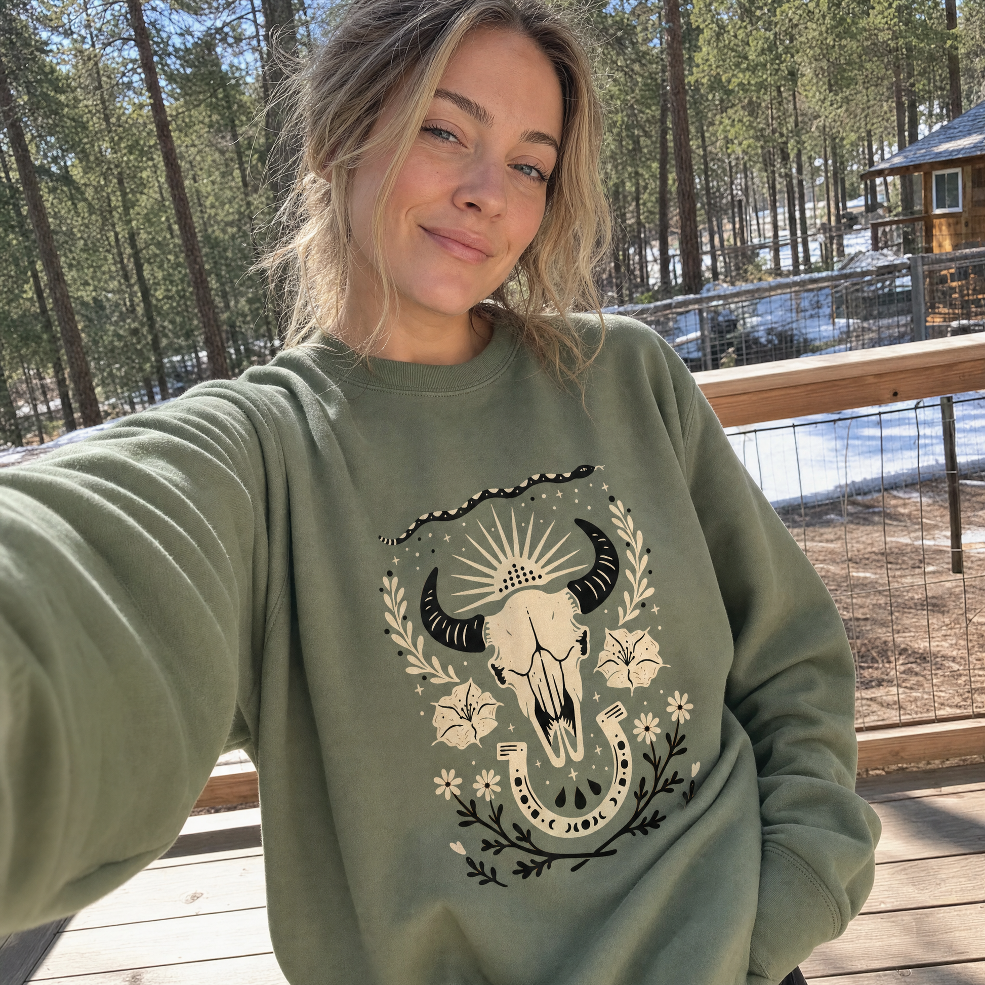 Model wearing the Western sweatshirt in Military Green, lifestyle image 1