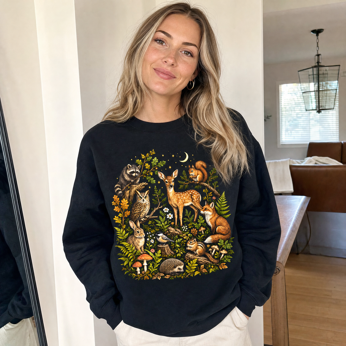 Model wearing the Woodland Animals sweatshirt in Black
