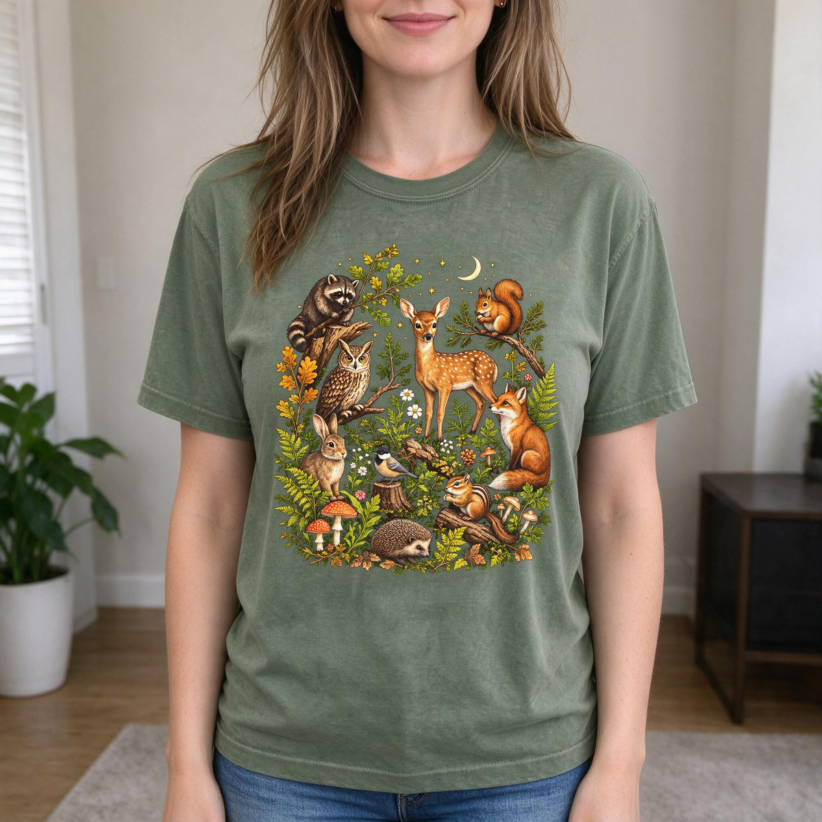 Model wearing the Woodland Animals comfort colors tee in Moss