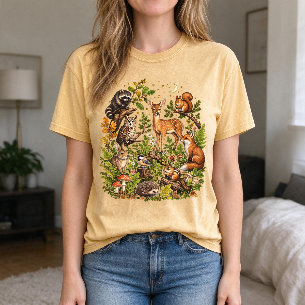 Model wearing the Woodland Animals comfort colors tee in Mustard