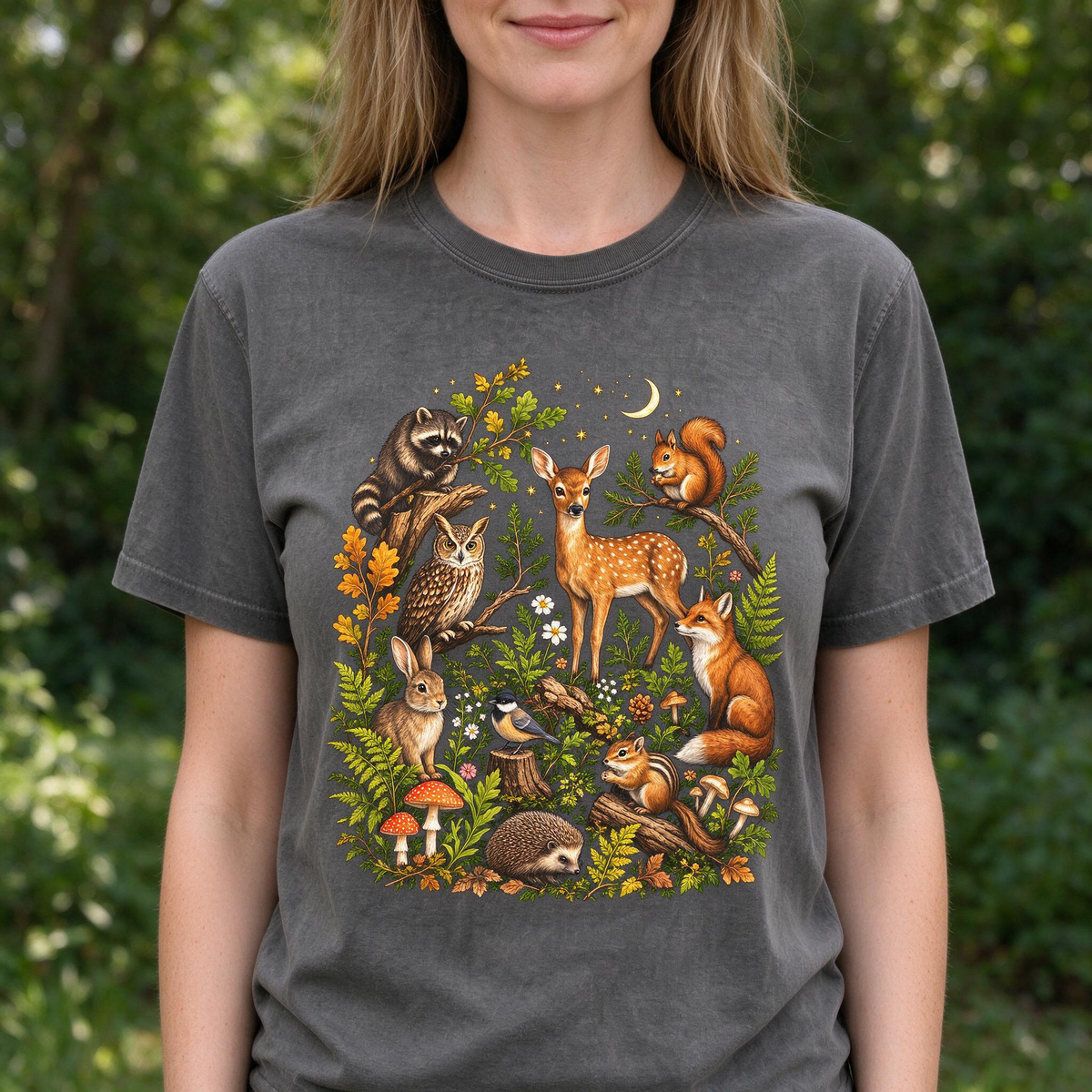 Model wearing the Woodland Animals comfort colors tee in Pepper