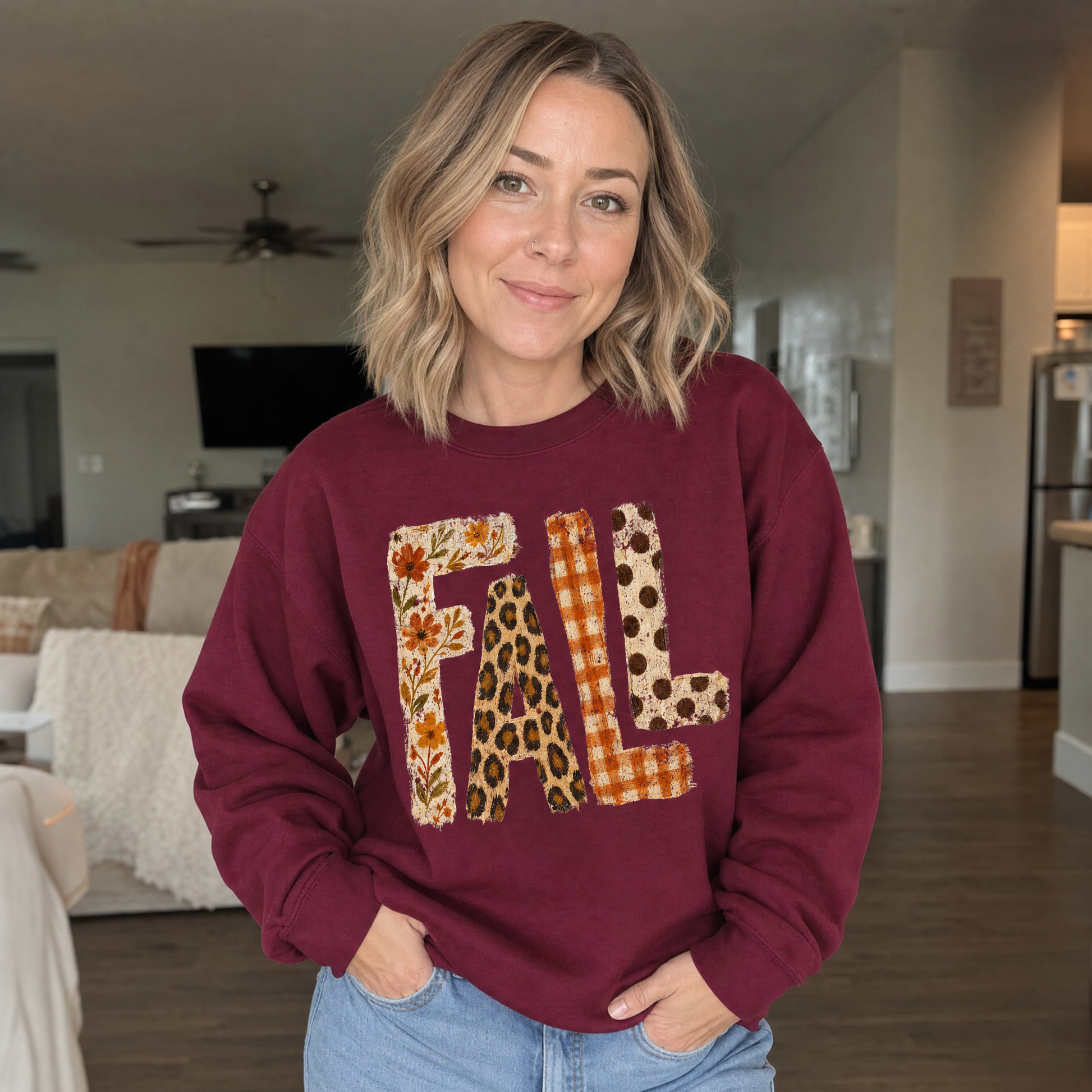 Model wearing the Fall Pattern Letters sweatshirt in Maroon